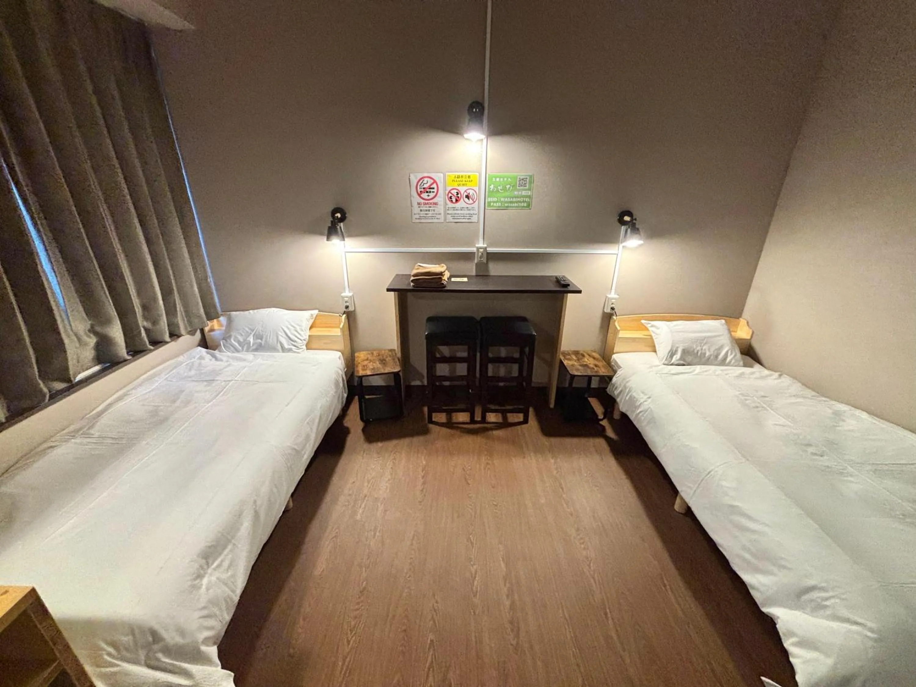 Bed in Wasabi Mita Hotel