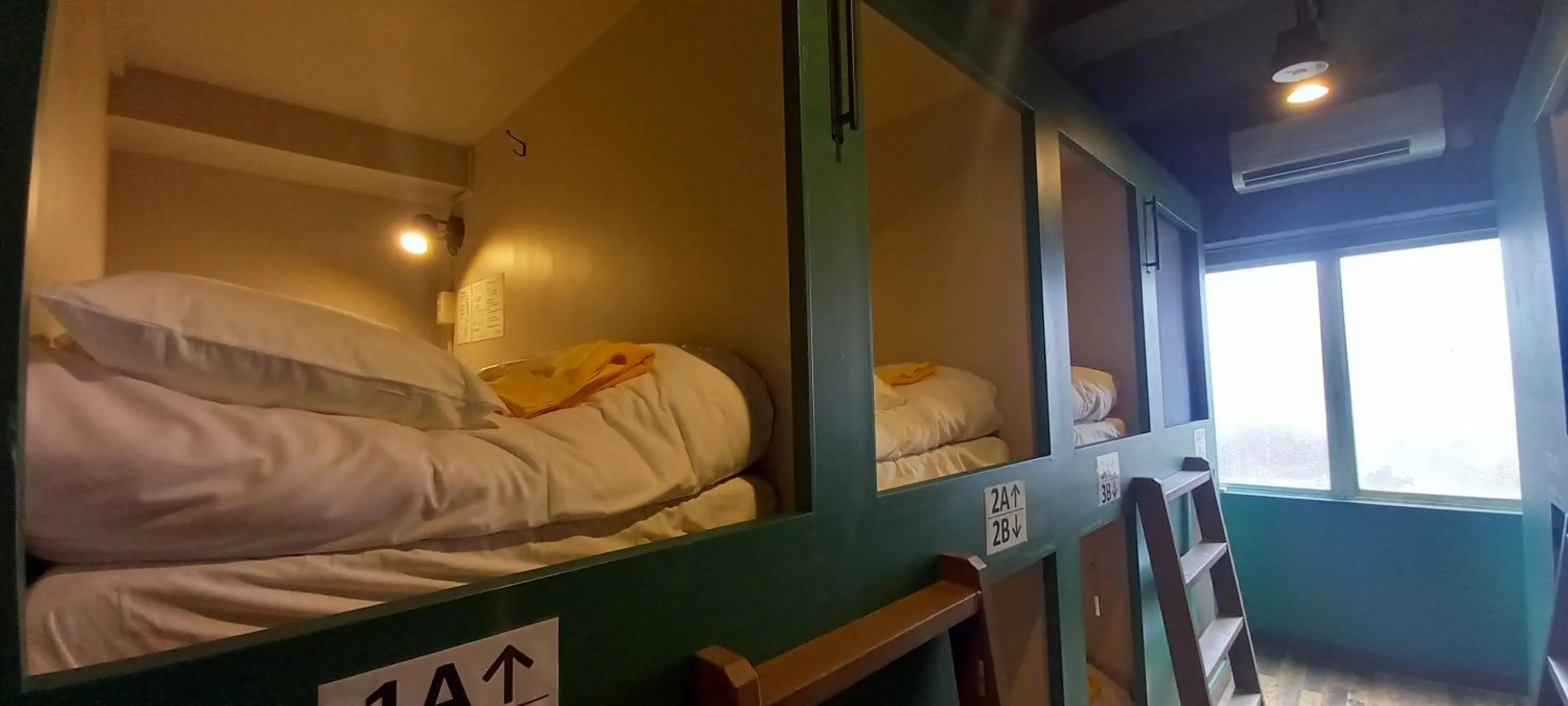 Bed in Wasabi Mita Hotel