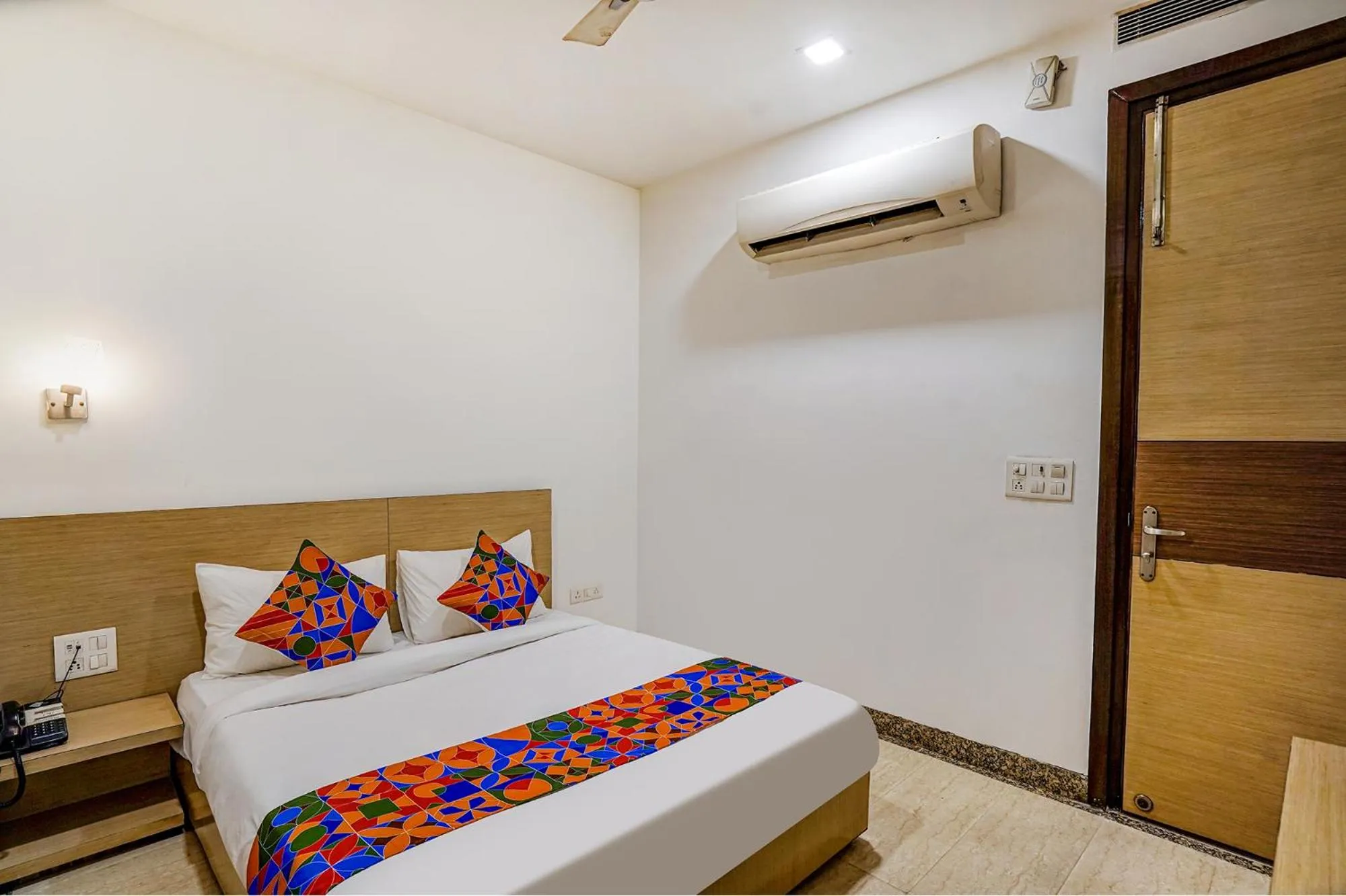 Photo of the whole room, Bed in FabExpress Vasundhara Suits