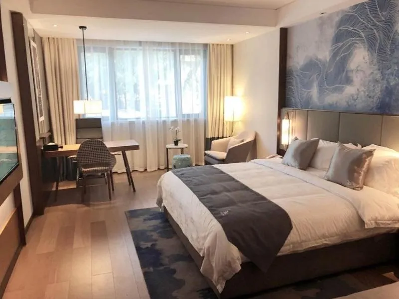 Bed in GreenTree Eastern Hotel Anshun Anshun Zhenning Huangguoshu