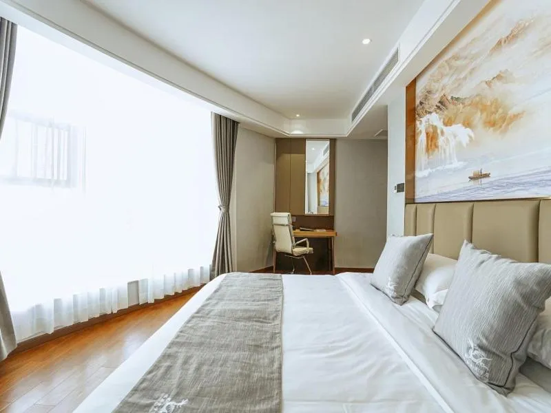 Bed in GreenTree Eastern Hotel Anshun Anshun Zhenning Huangguoshu
