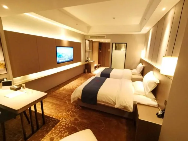 Bed in GreenTree Eastern Hotel Anshun Anshun Zhenning Huangguoshu