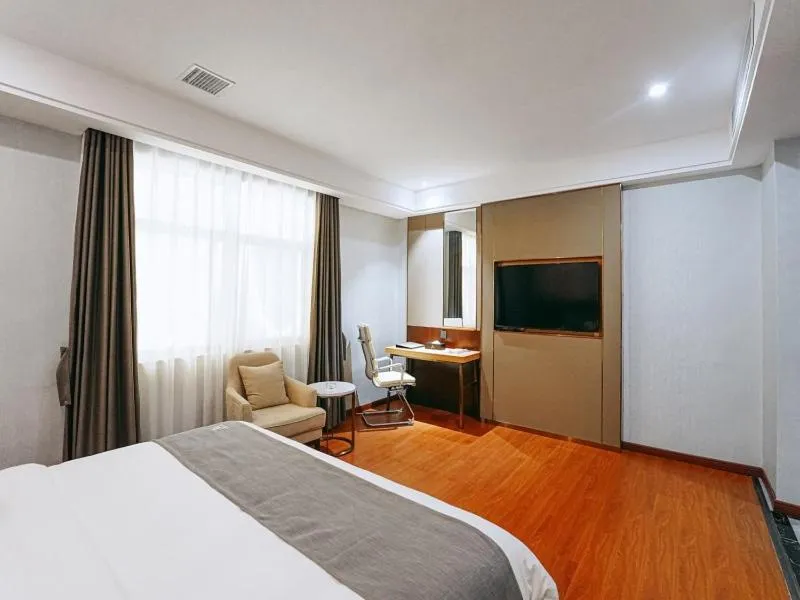 Bed in GreenTree Eastern Hotel Anshun Anshun Zhenning Huangguoshu