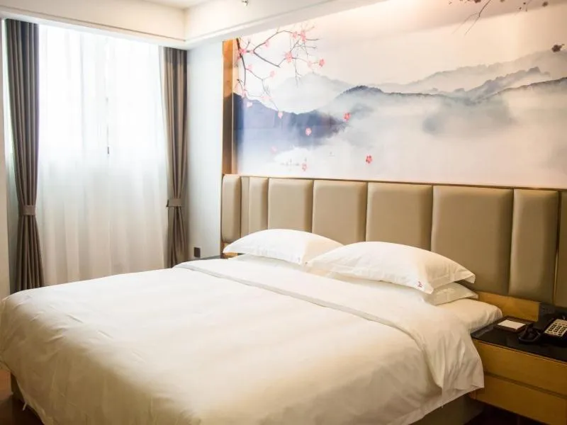 Bed in GreenTree Eastern Hotel Anshun Anshun Zhenning Huangguoshu