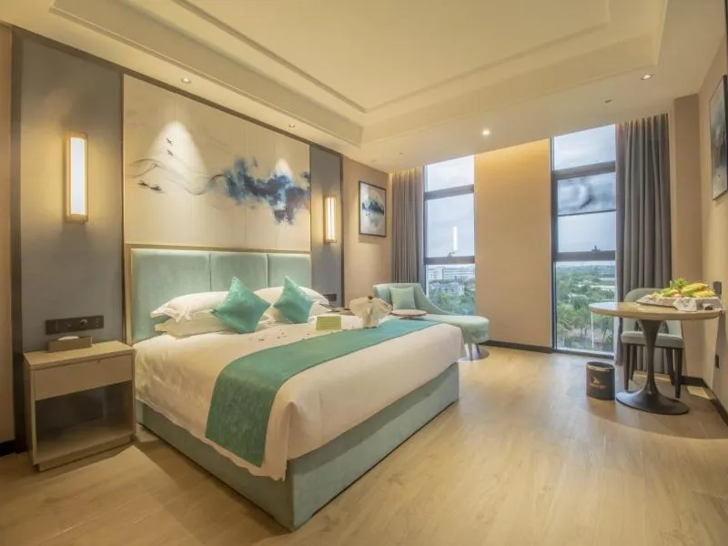 Bed in GreenTree Eastern Hotel Hainan Free Trade Port Jiangdong New District Meilan Airport