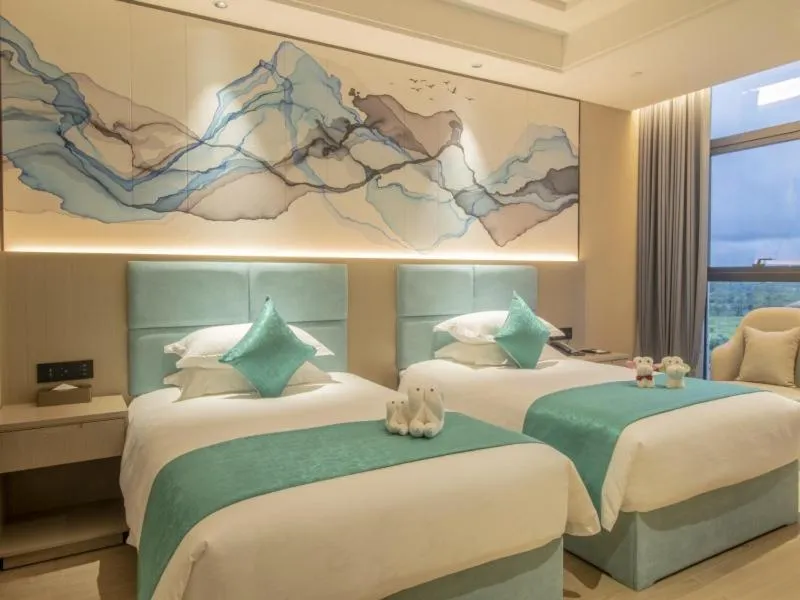 Bed in GreenTree Eastern Hotel Hainan Free Trade Port Jiangdong New District Meilan Airport