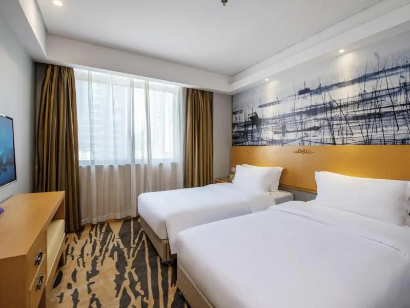Bed in GreenTree Eastern Hotel Shenzhen Futian Civic Center Jingtan Subway Station