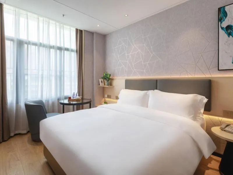 Bed in GreenTree Eastern Hotel Shenzhen Futian Civic Center Jingtan Subway Station
