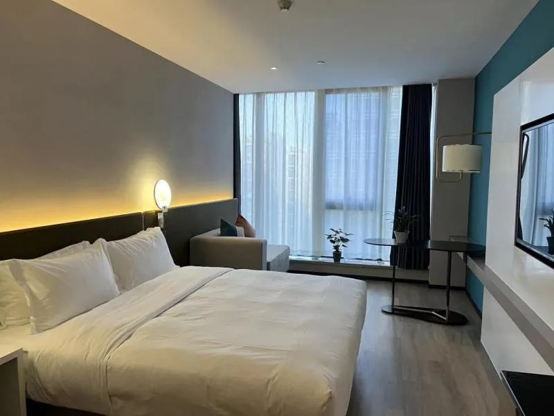 Bed in GreenTree Eastern Hotel Yiwu International Trade City