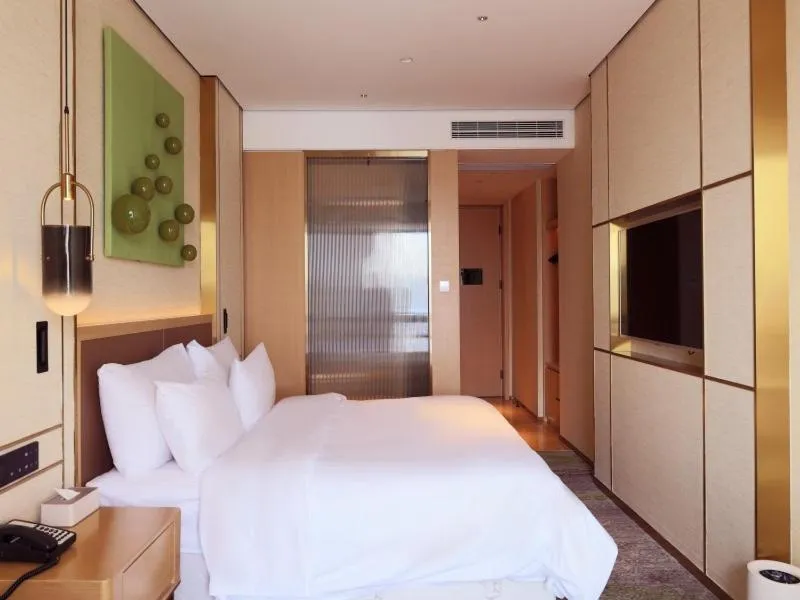 Bed in Geli Hotel Bengbu Wanda Plaza Nanxiang City