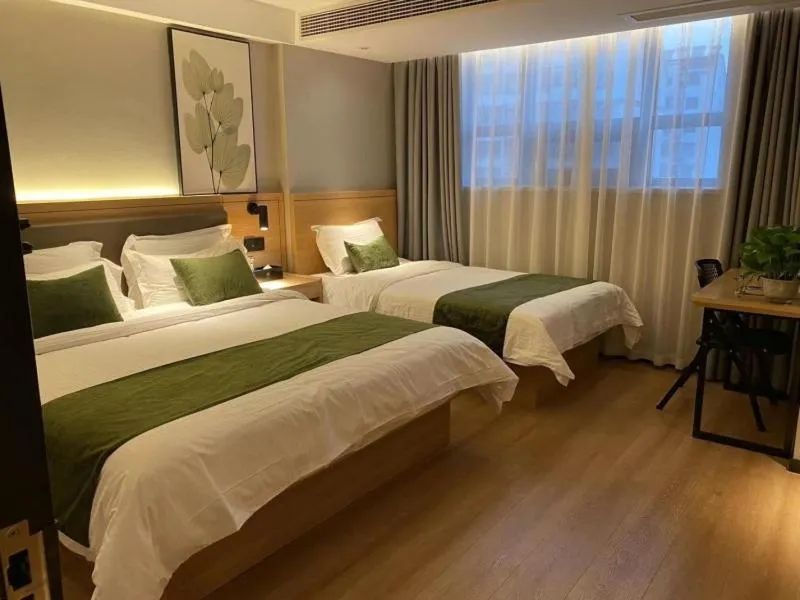 Bed in GreenTree Inn Express Hotel Suzhou Zhangjianggang Free Trade Zone Central Plaza