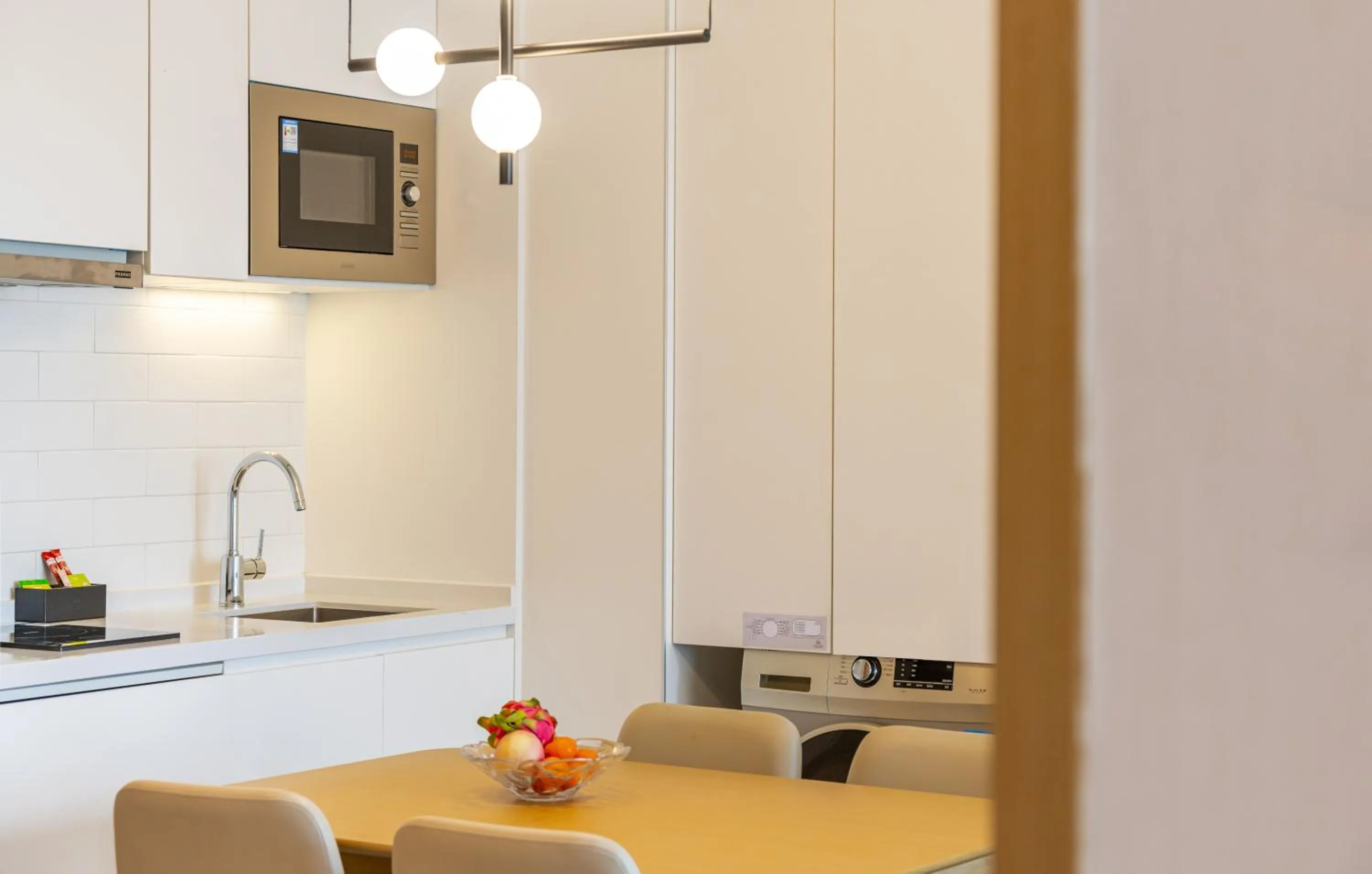 Kitchen or kitchenette in Keypai Hotel