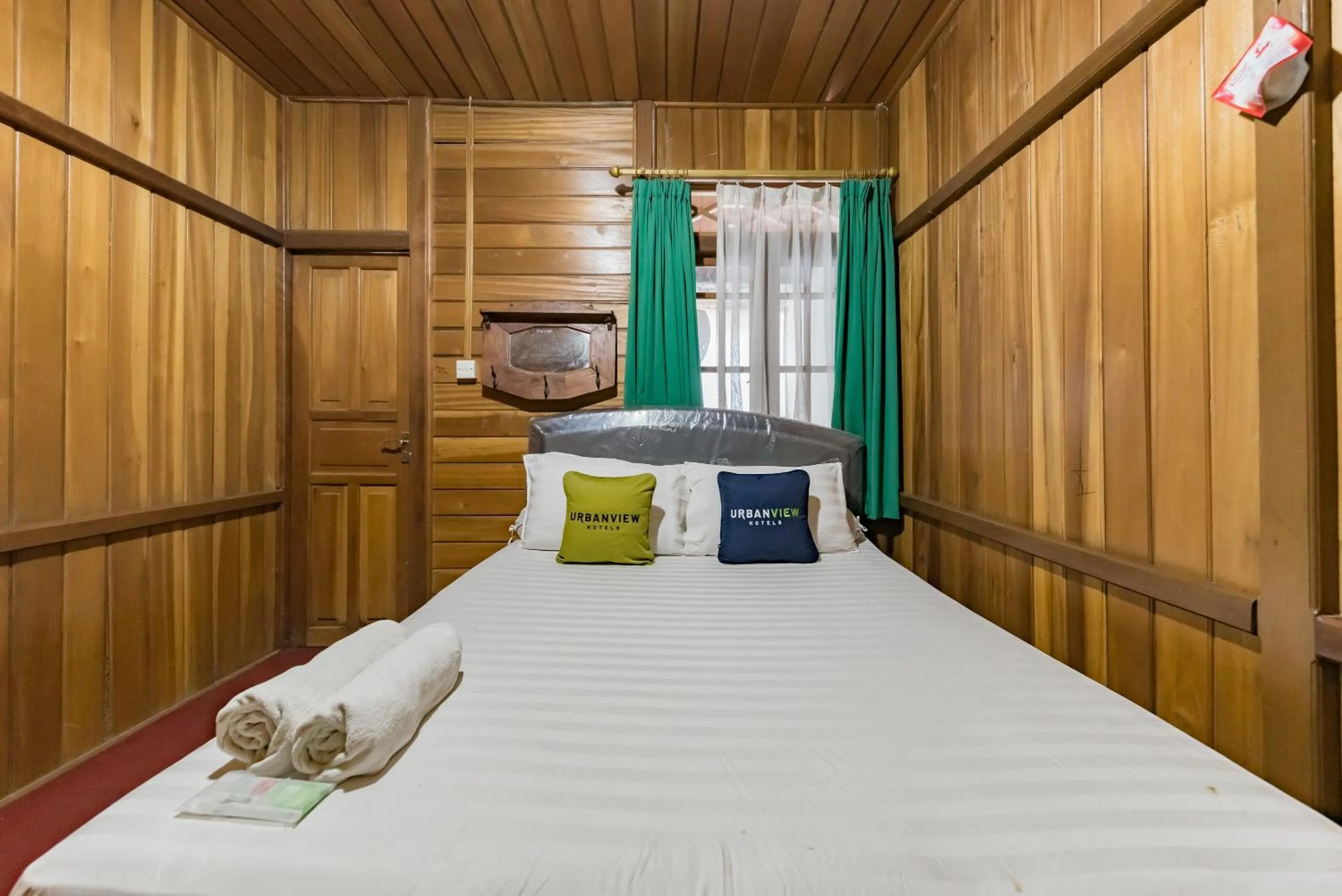 Bed in Urbanview Resort Anty Cisarua Tugu Puncak by RedDoorz