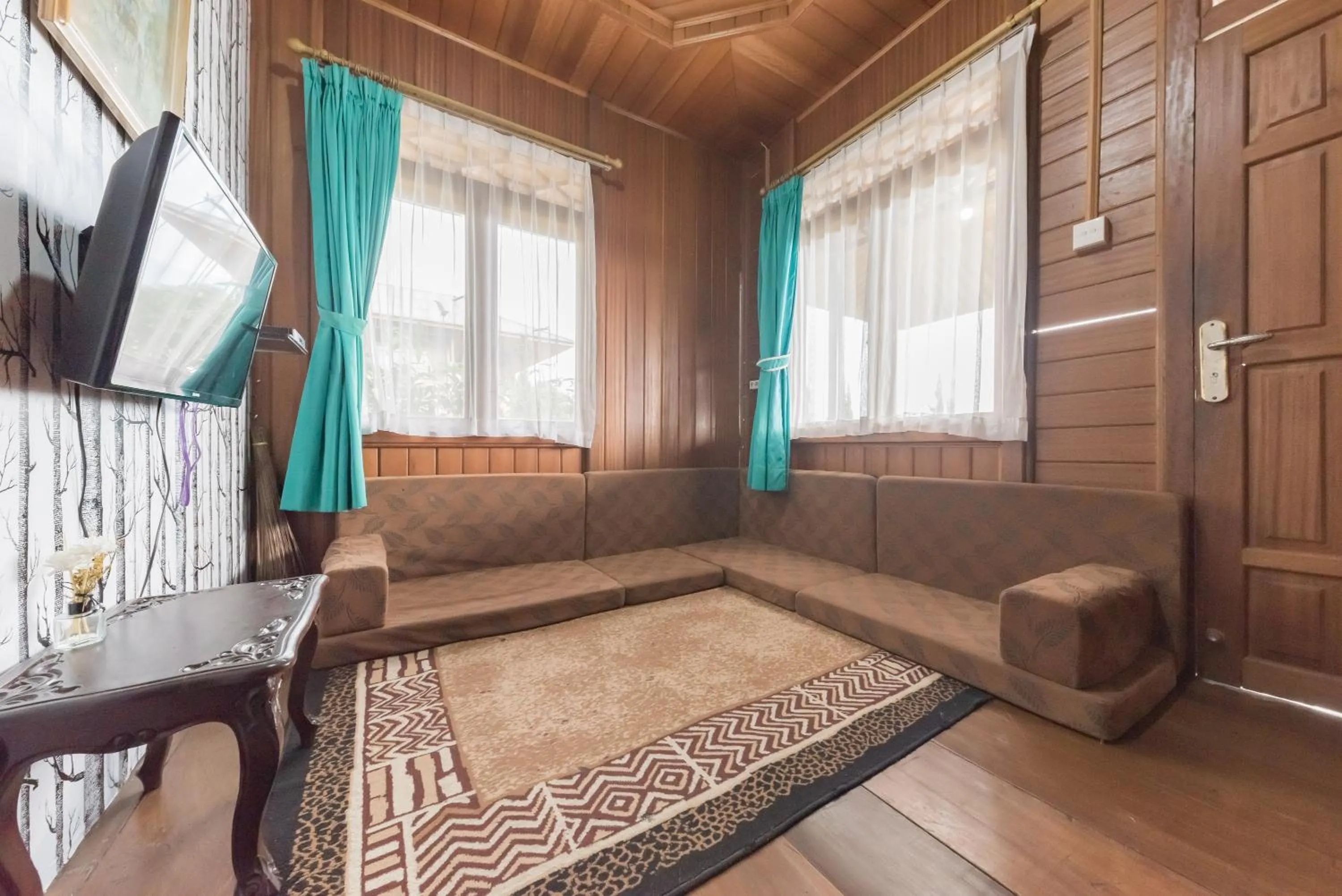 Living room in Urbanview Resort Anty Cisarua Tugu Puncak by RedDoorz