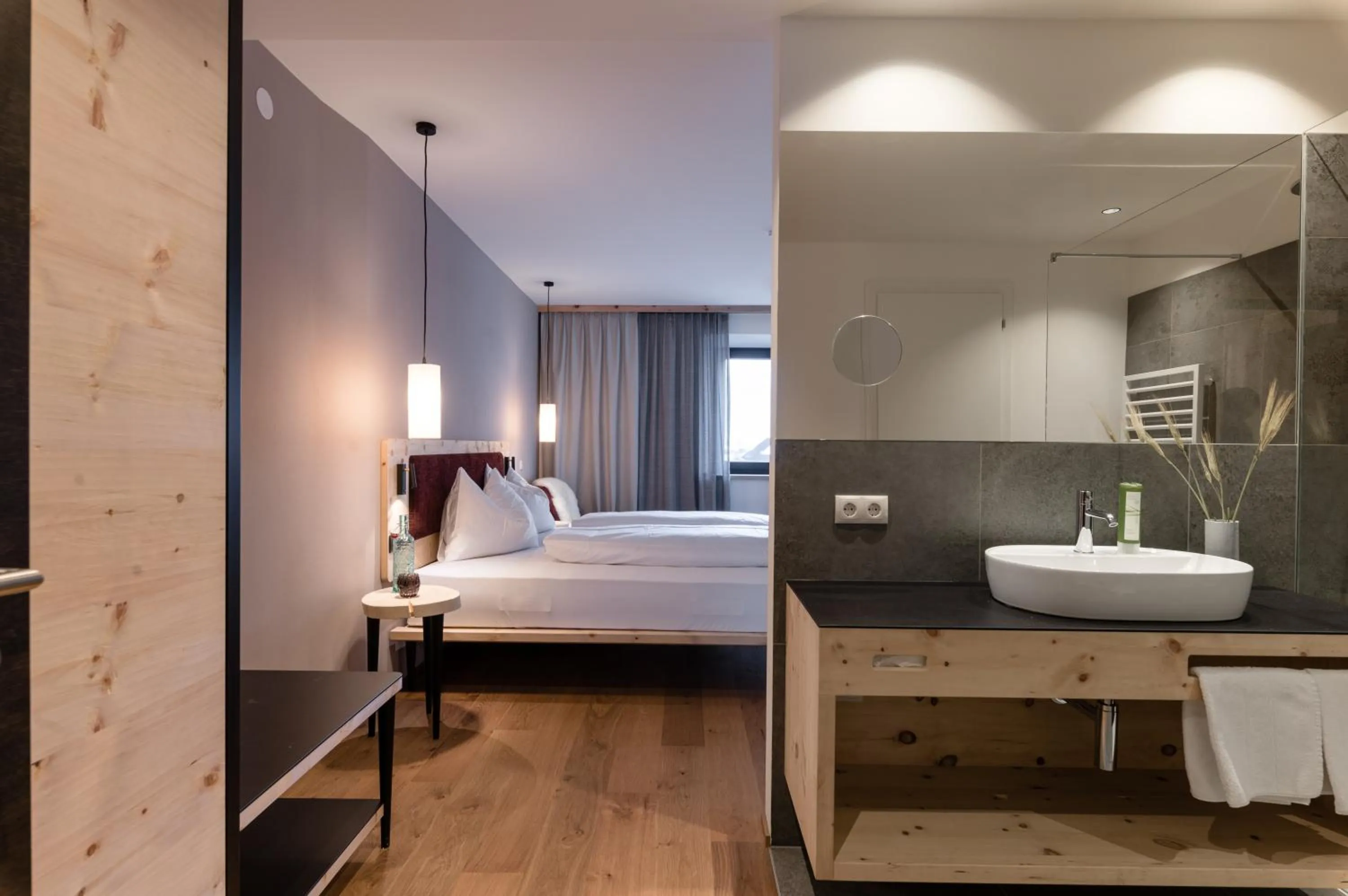 Bathroom, Bed in Hotel Mühlenerhof