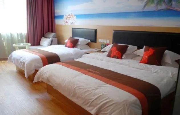 Bed in Junyi Hotel Jinhua Wuyi Hot Spring Bus Terminal Station