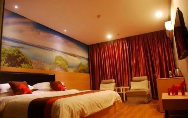 Bed in Junyi Hotel Jinhua Wuyi Hot Spring Bus Terminal Station