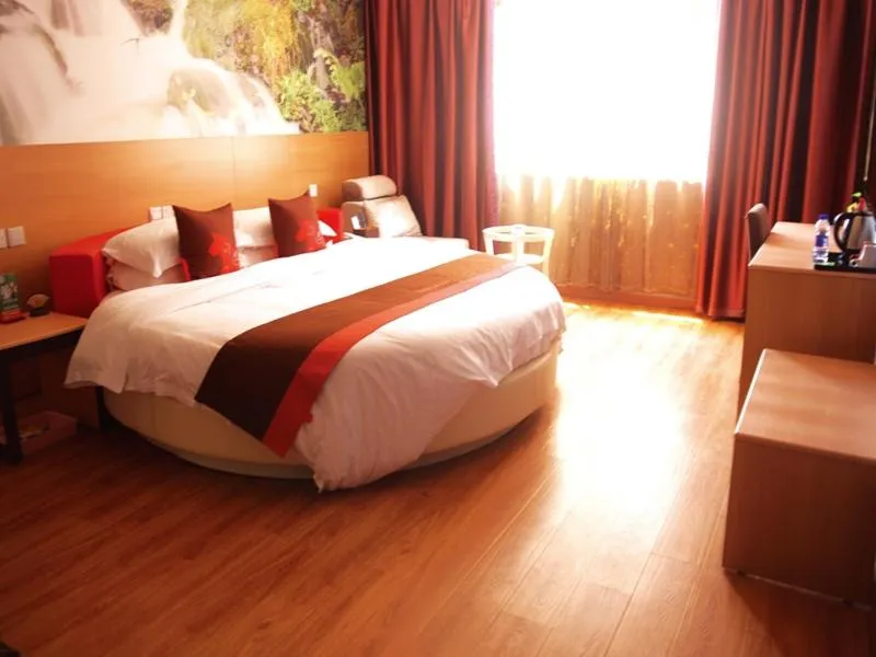 Bed in Junyi Hotel Jinhua Wuyi Hot Spring Bus Terminal Station