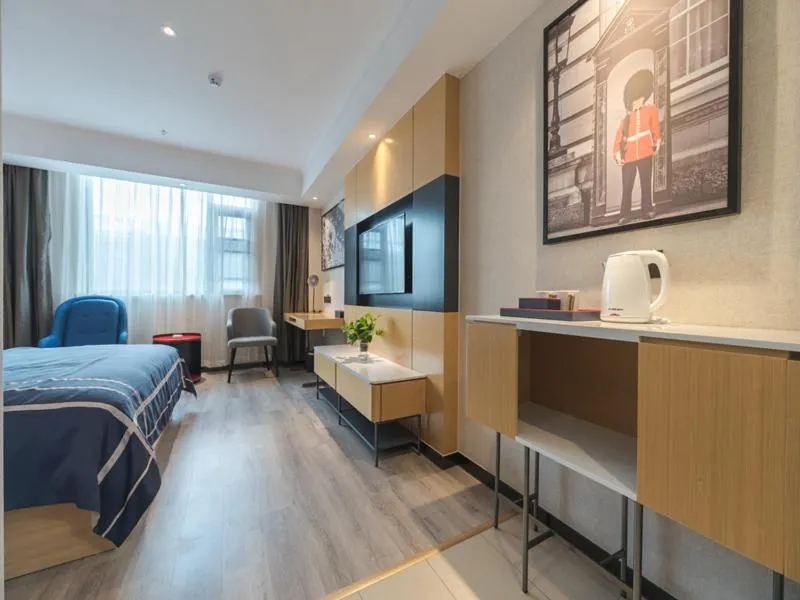 Bed in LanOu Hotel Wuxi Anzhen East High-Speed Railway Station