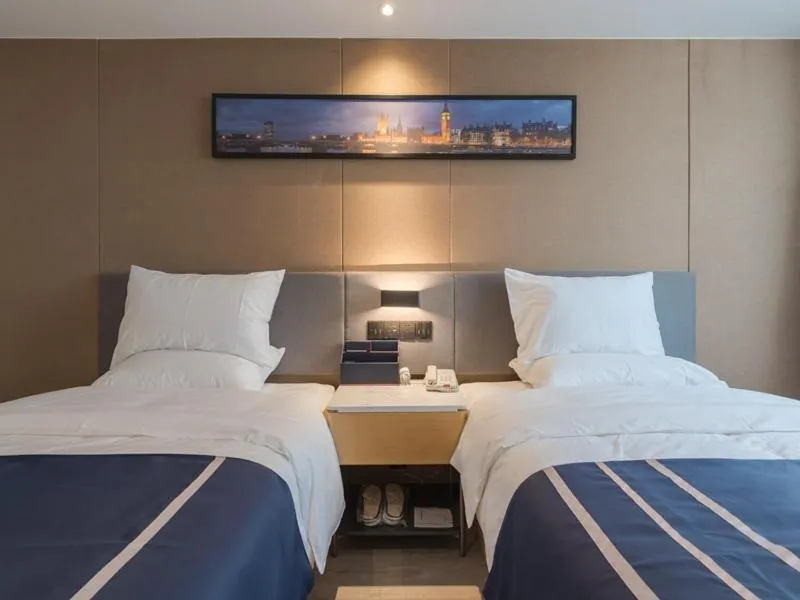 Bed in LanOu Hotel Wuxi Anzhen East High-Speed Railway Station