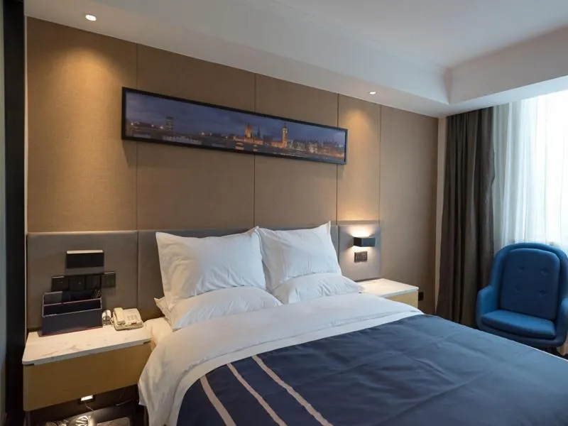 Bed in LanOu Hotel Wuxi Anzhen East High-Speed Railway Station
