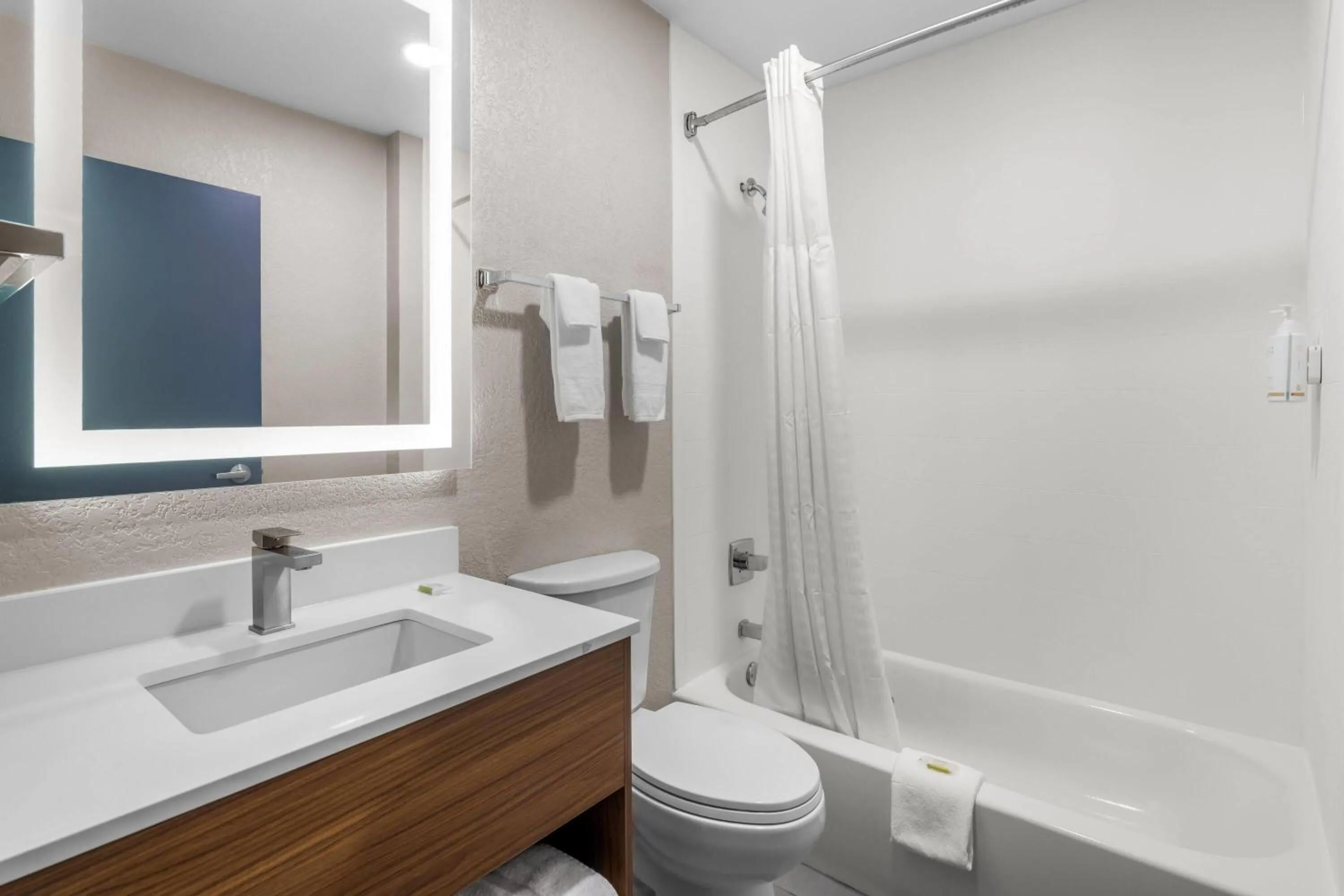 Bathroom in Days Inn & Suites by Wyndham Brandon Amphitheater