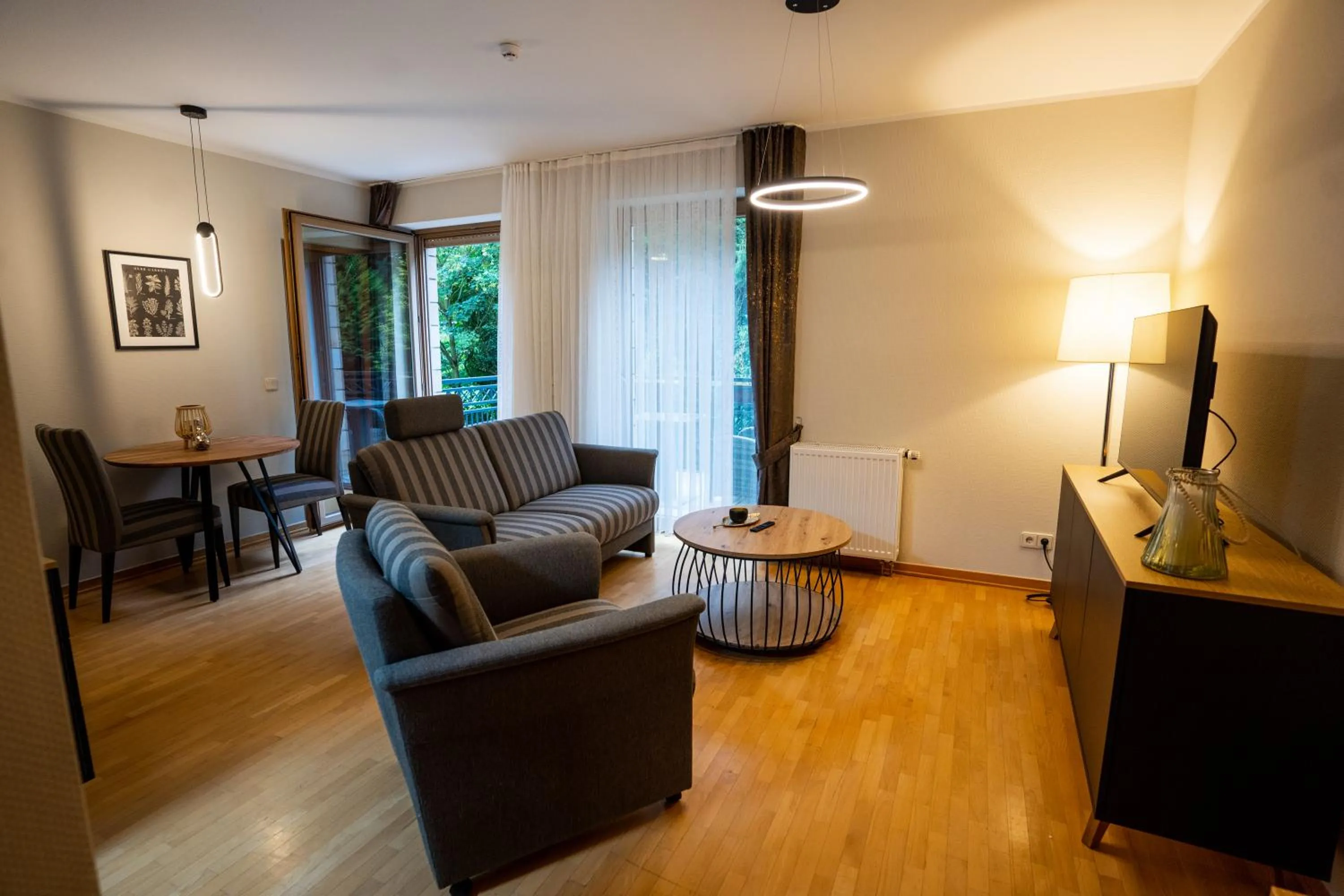 TV and multimedia in Hotel CityHome am Kurpark