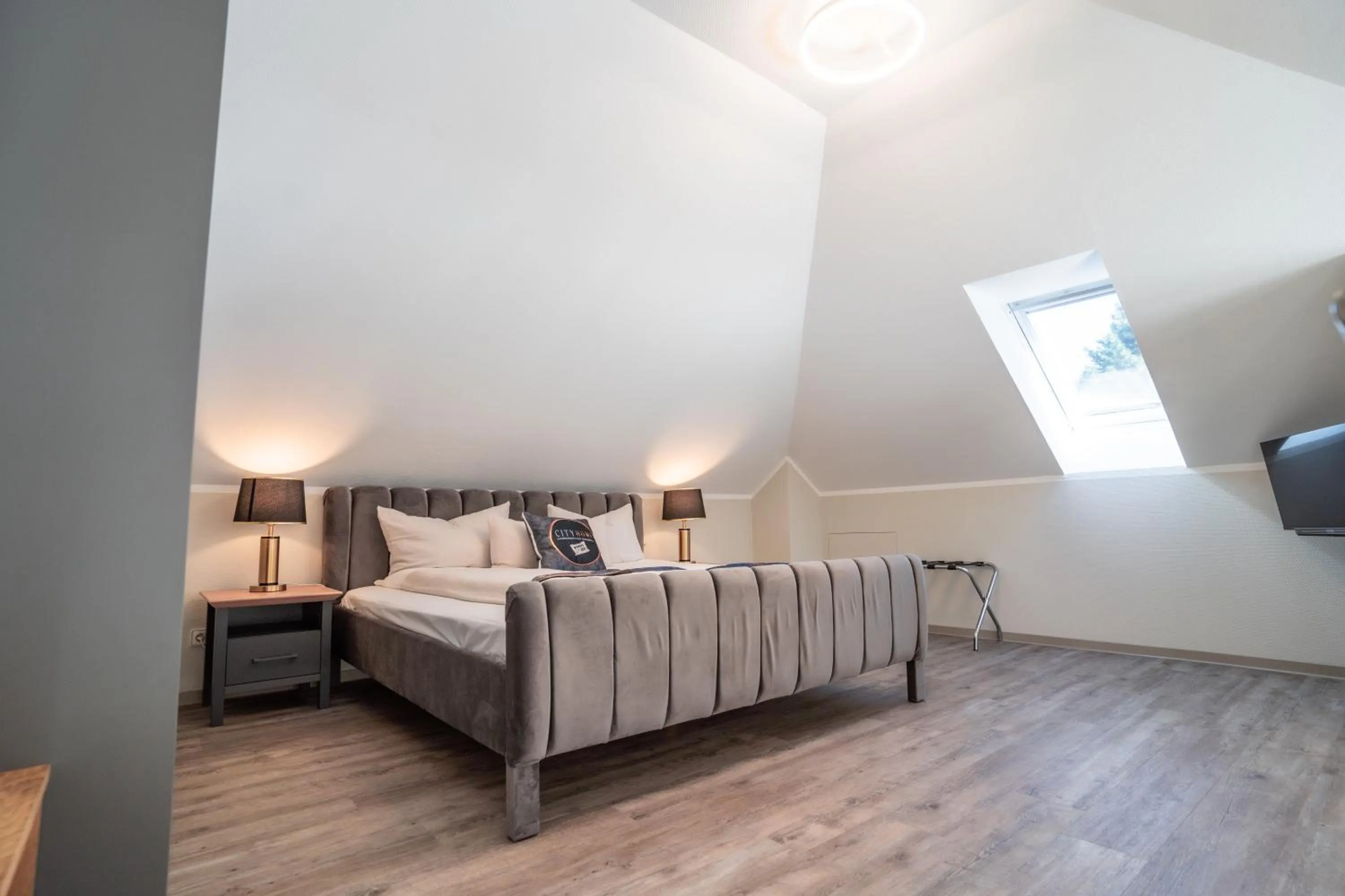 Bed in Hotel CityHome am Kurpark