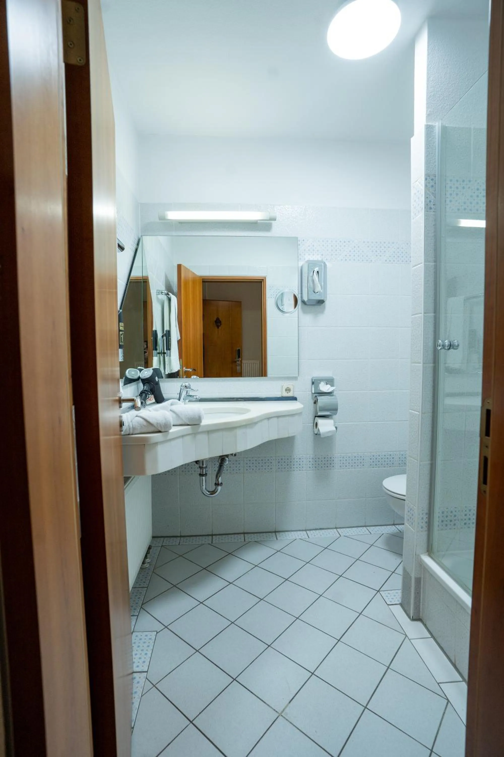 Shower in Hotel CityHome am Kurpark