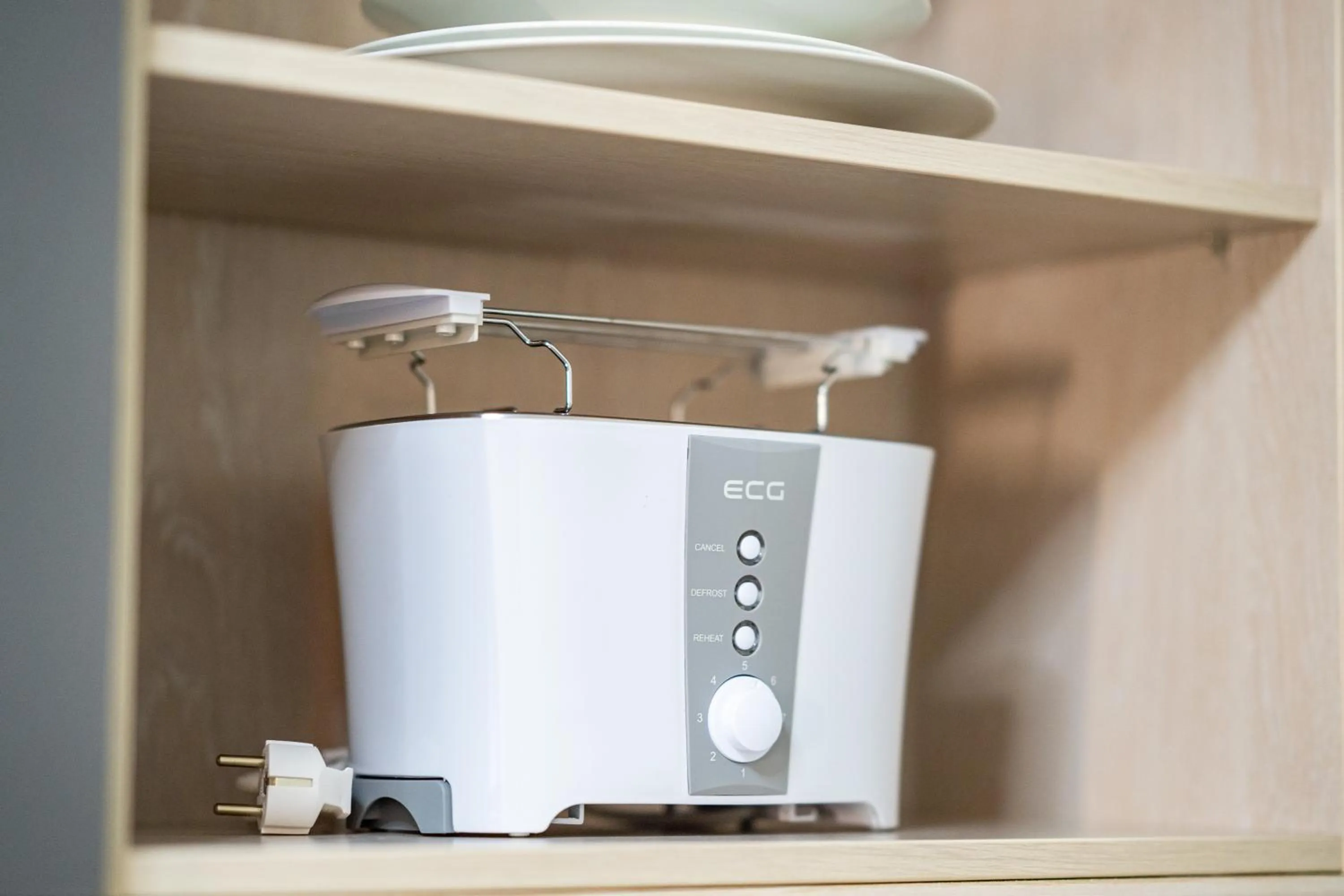 Kitchen or kitchenette in Hotel CityHome am Kurpark