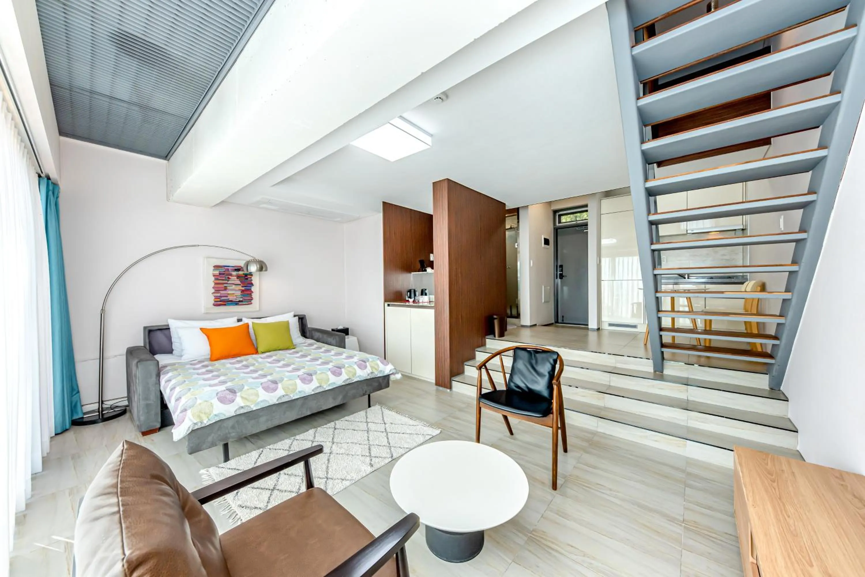 Living room, Bed in Jeju Bom stay & Art Gallery