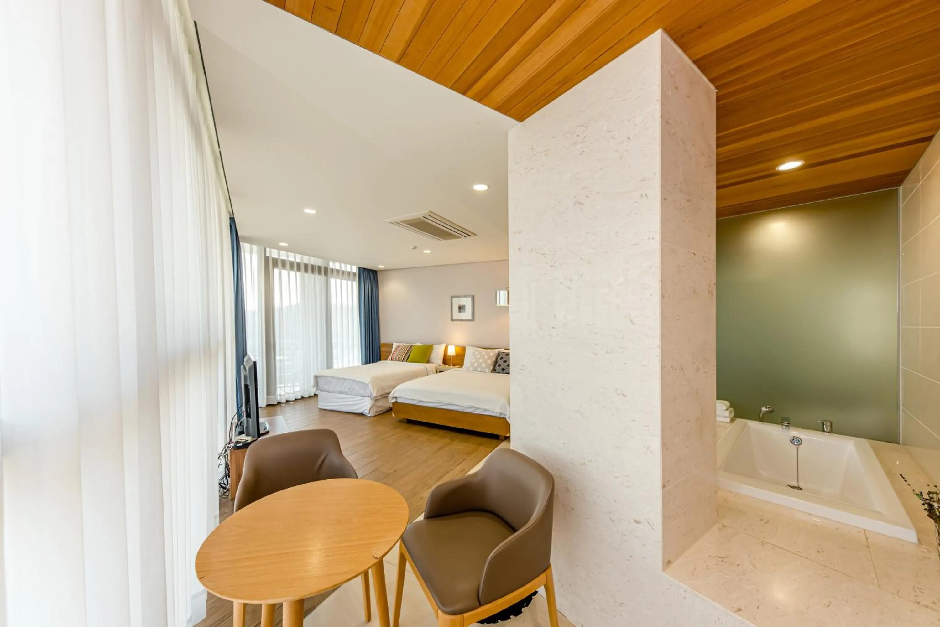 Living room, Bed in Jeju Bom stay & Art Gallery