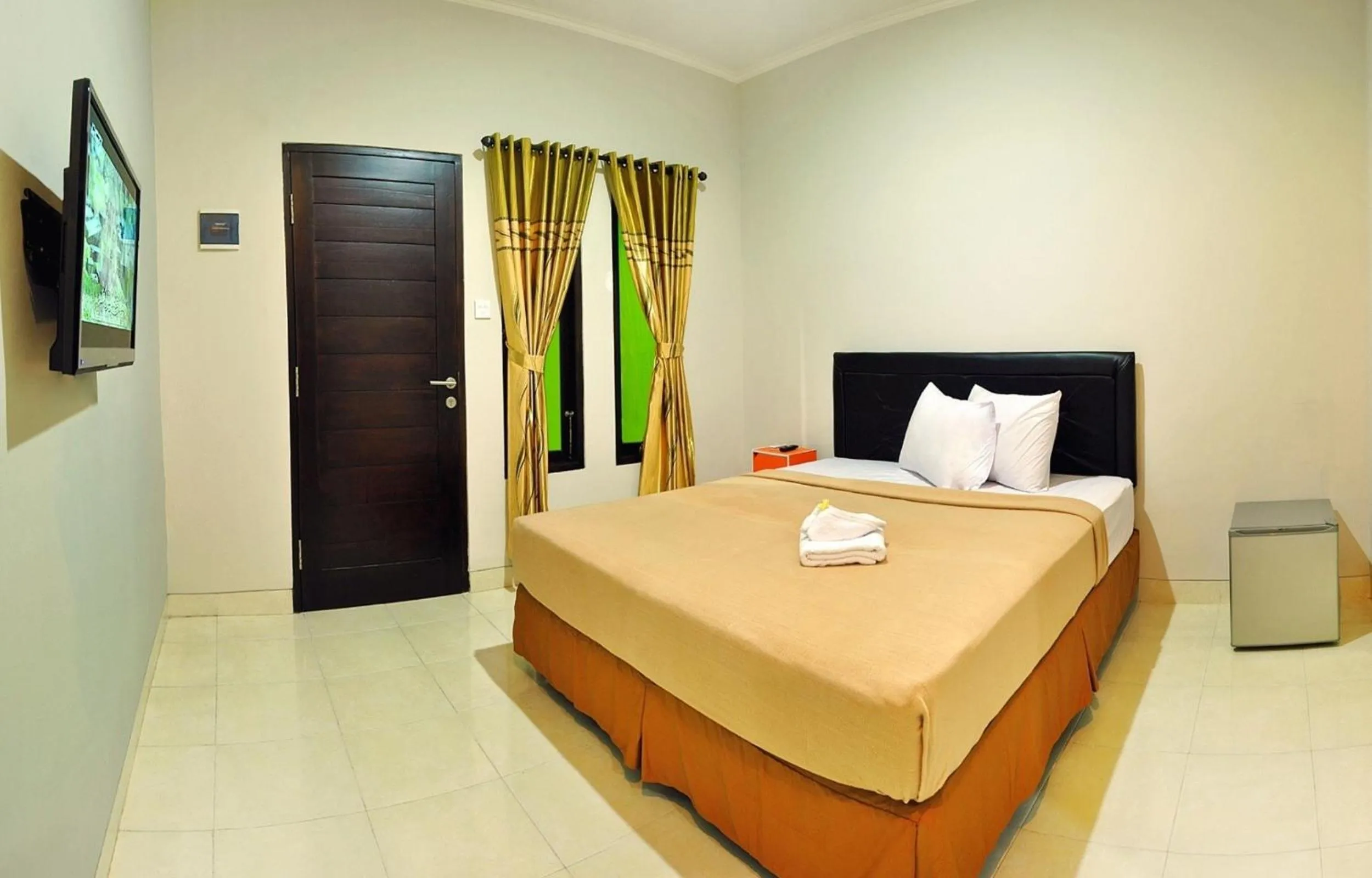 Bed in Amerta Home Stay Bali
