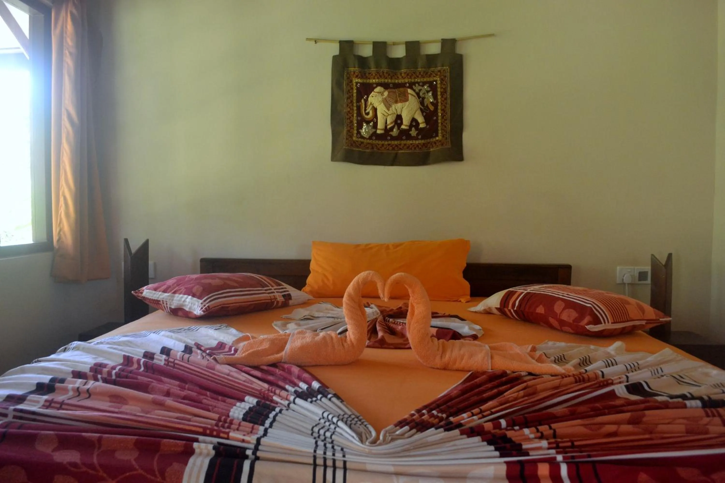 Photo of the whole room, Bed in Puetz Travels Beach Resort