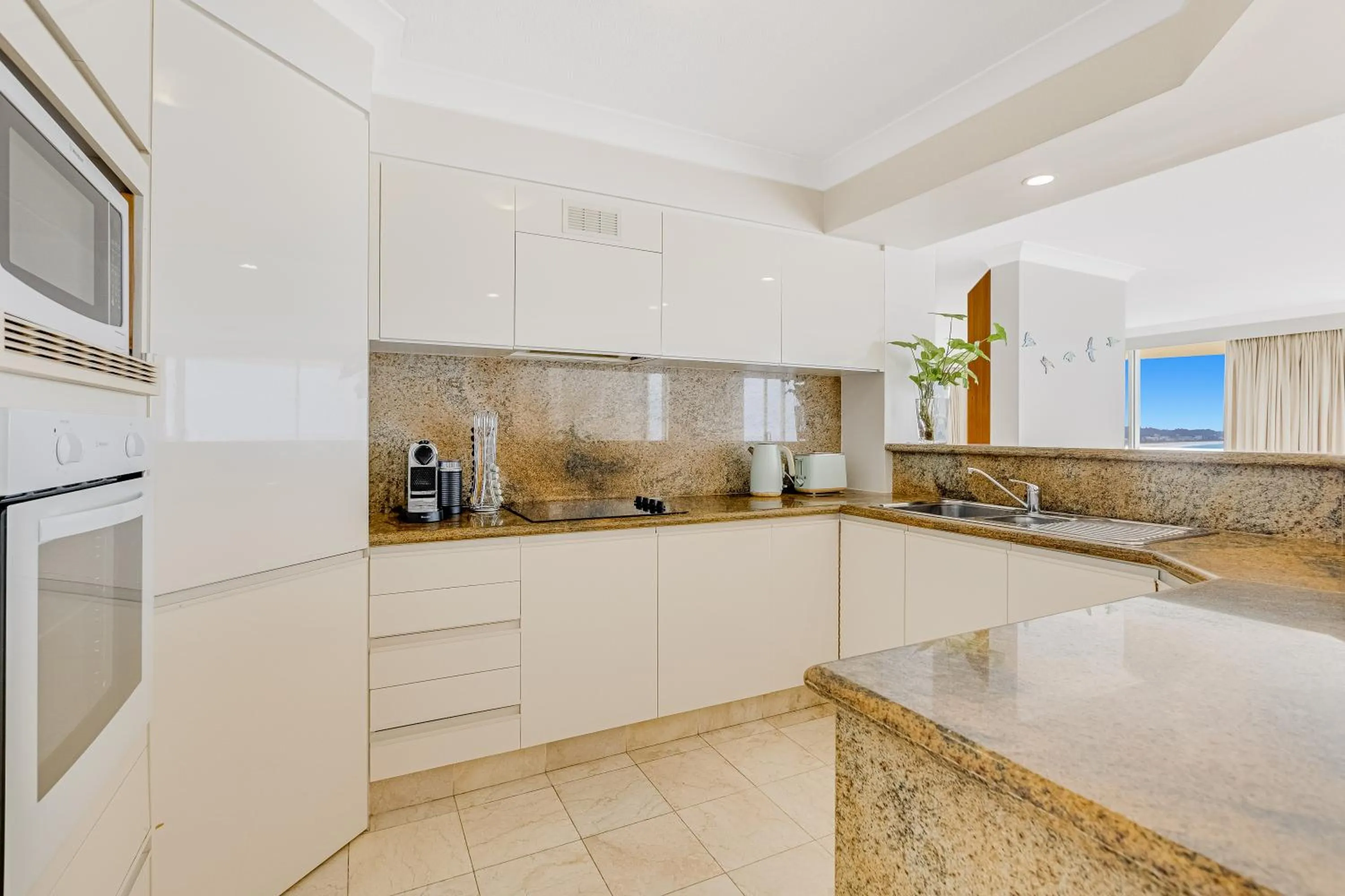 Kitchen or kitchenette in Meridian Tower Kirra Beach