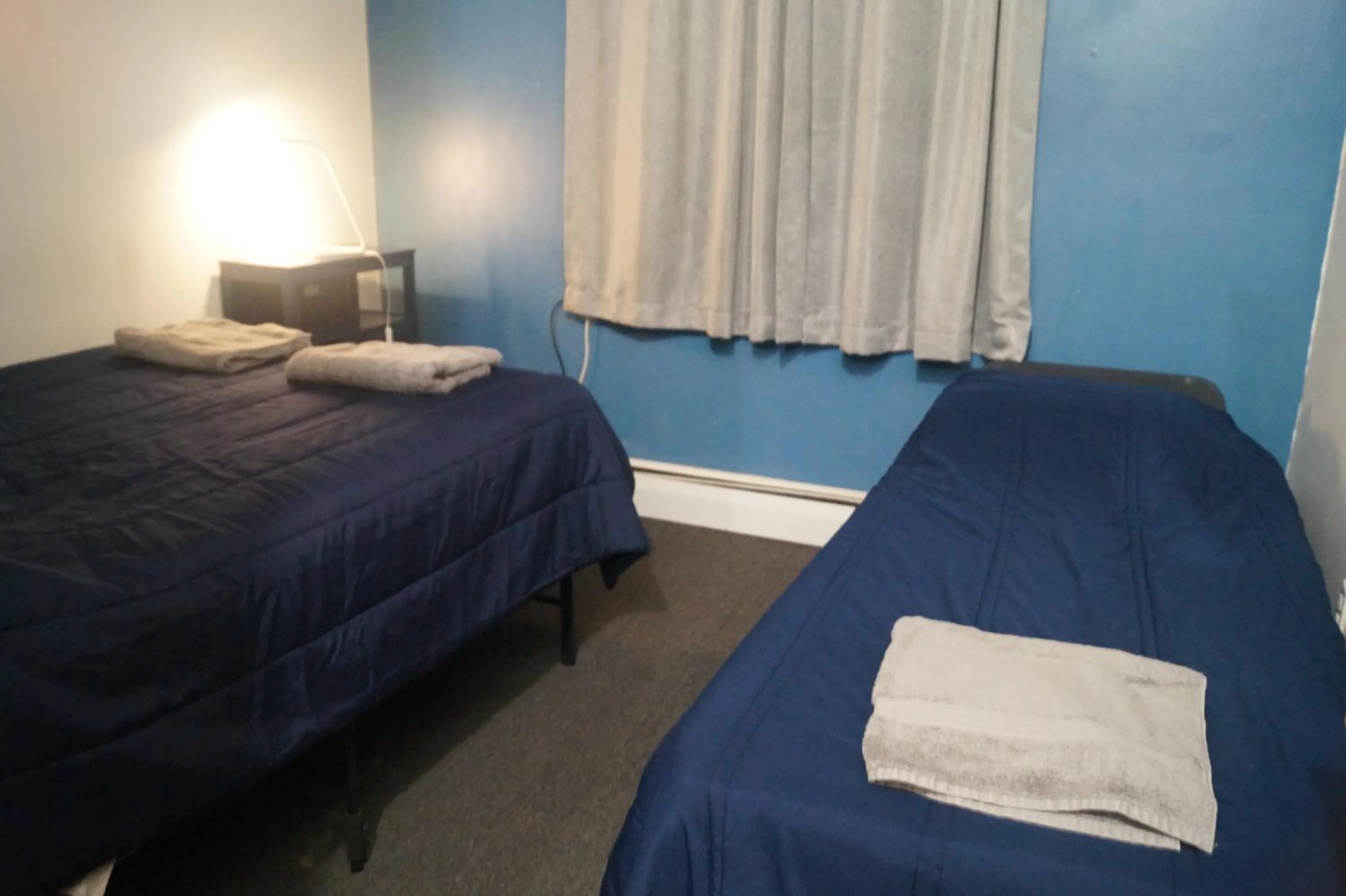 Bed in Macaw Guest House