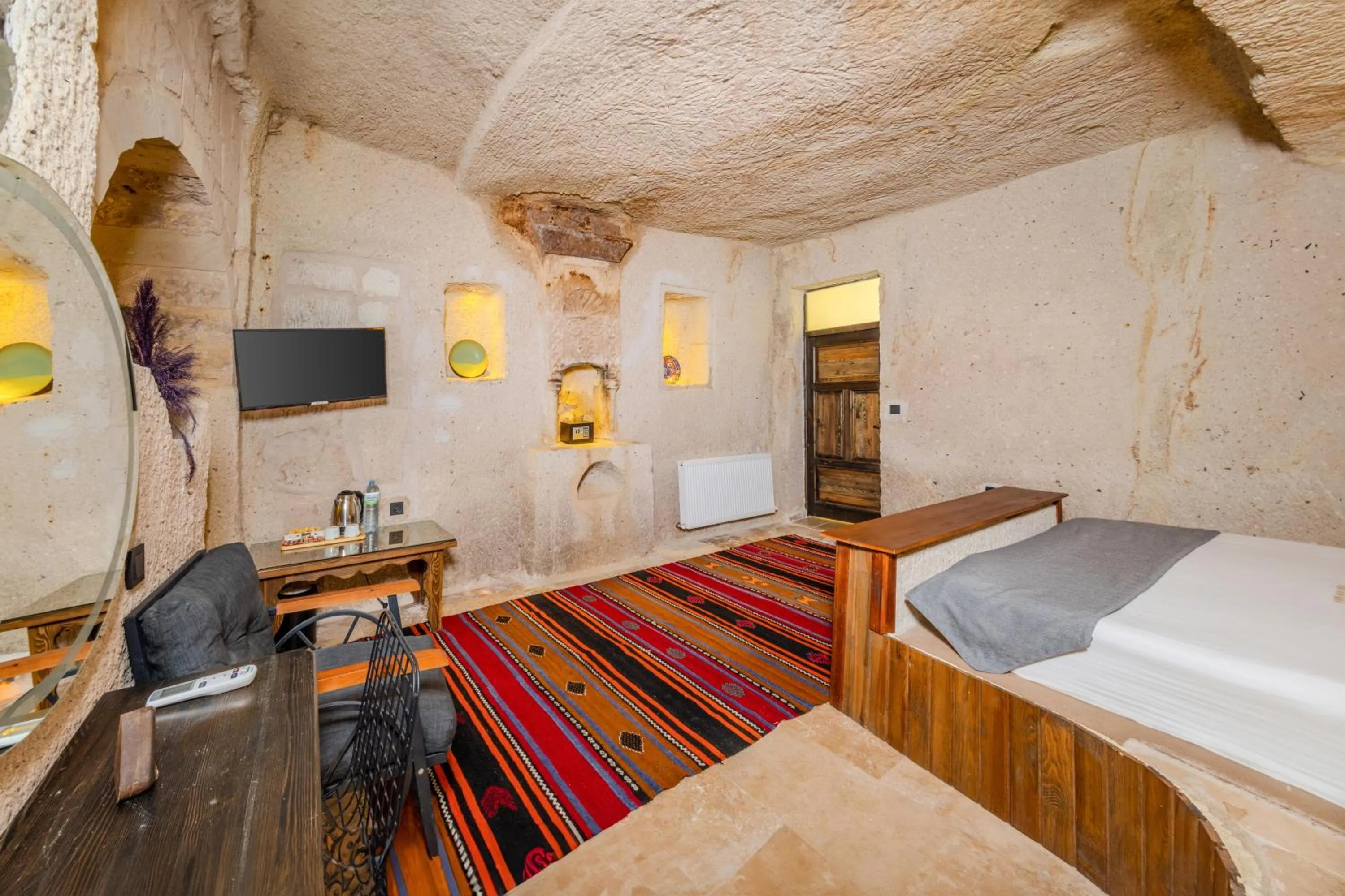 Living room, Bed in Angel View Suites