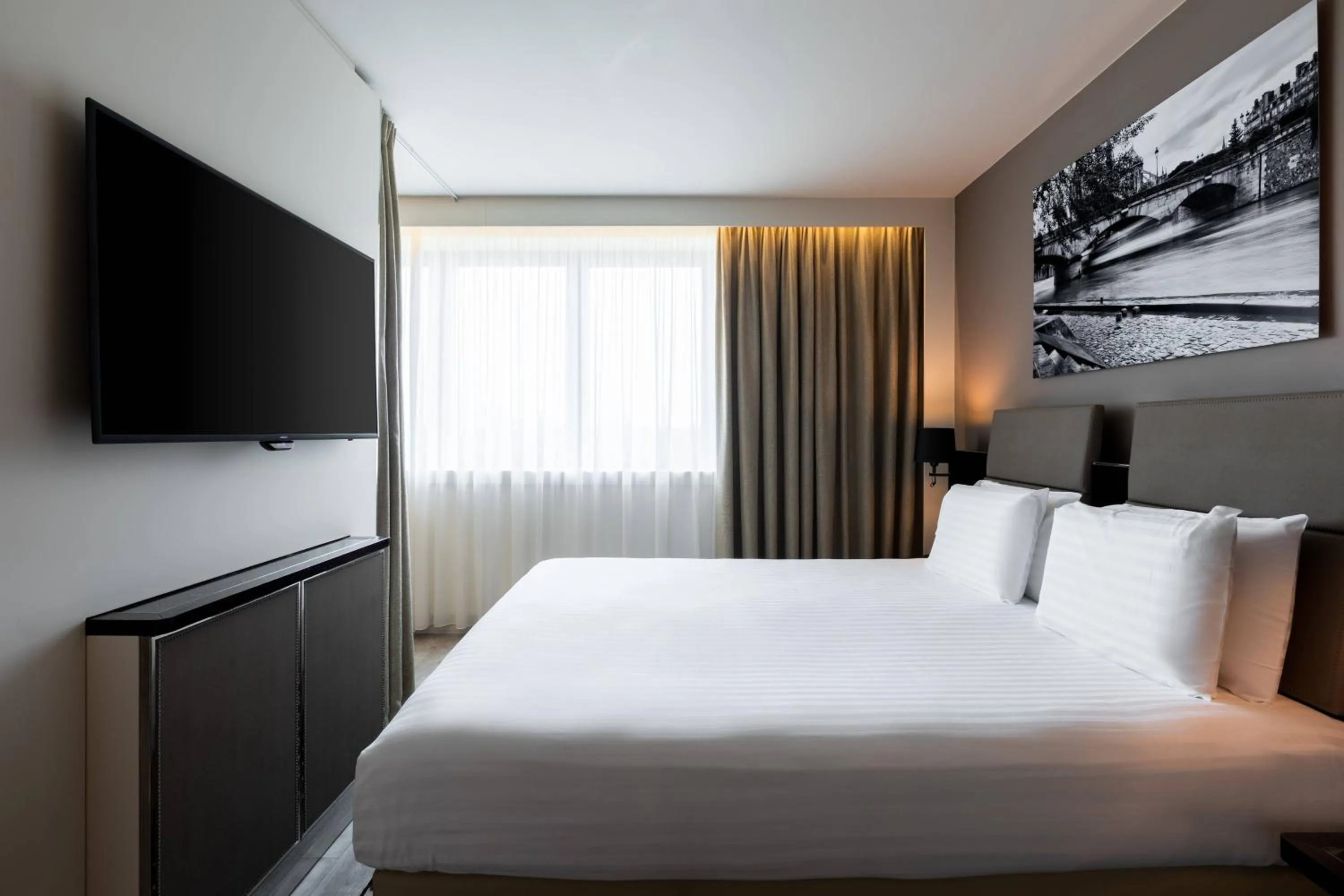 Photo of the whole room, Bed in AC Hotel Paris Porte Maillot by Marriott