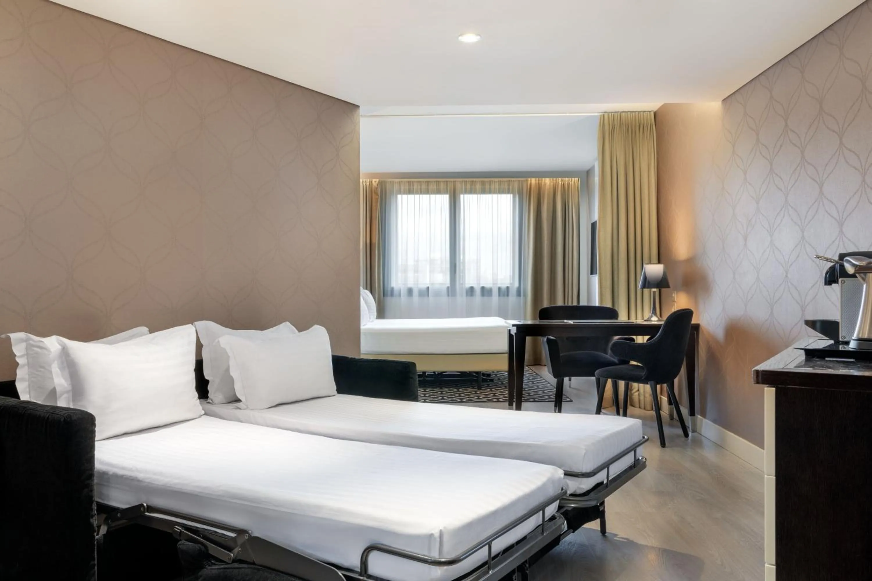 Photo of the whole room, Bed in AC Hotel Paris Porte Maillot by Marriott