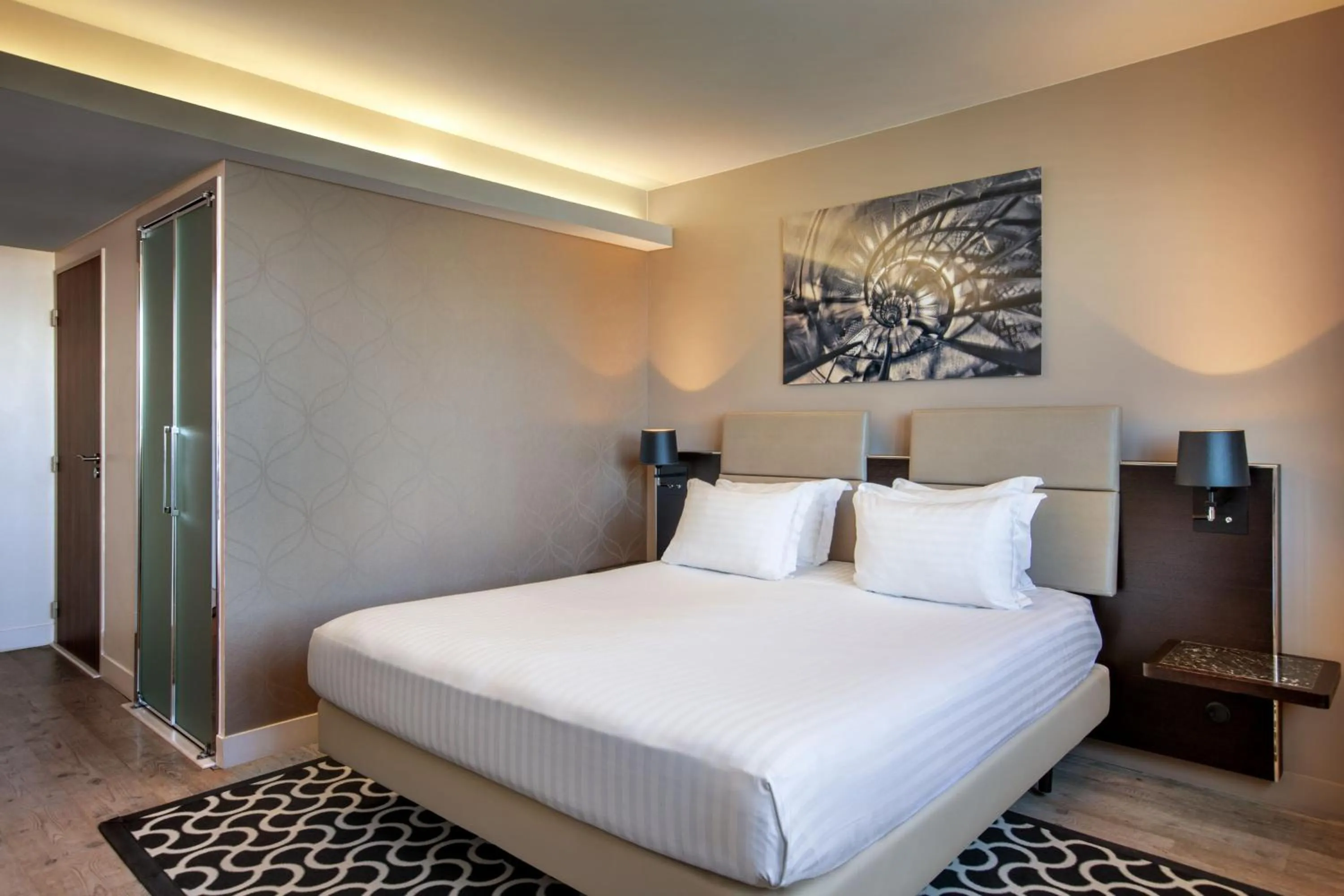 Photo of the whole room, Bed in AC Hotel Paris Porte Maillot by Marriott