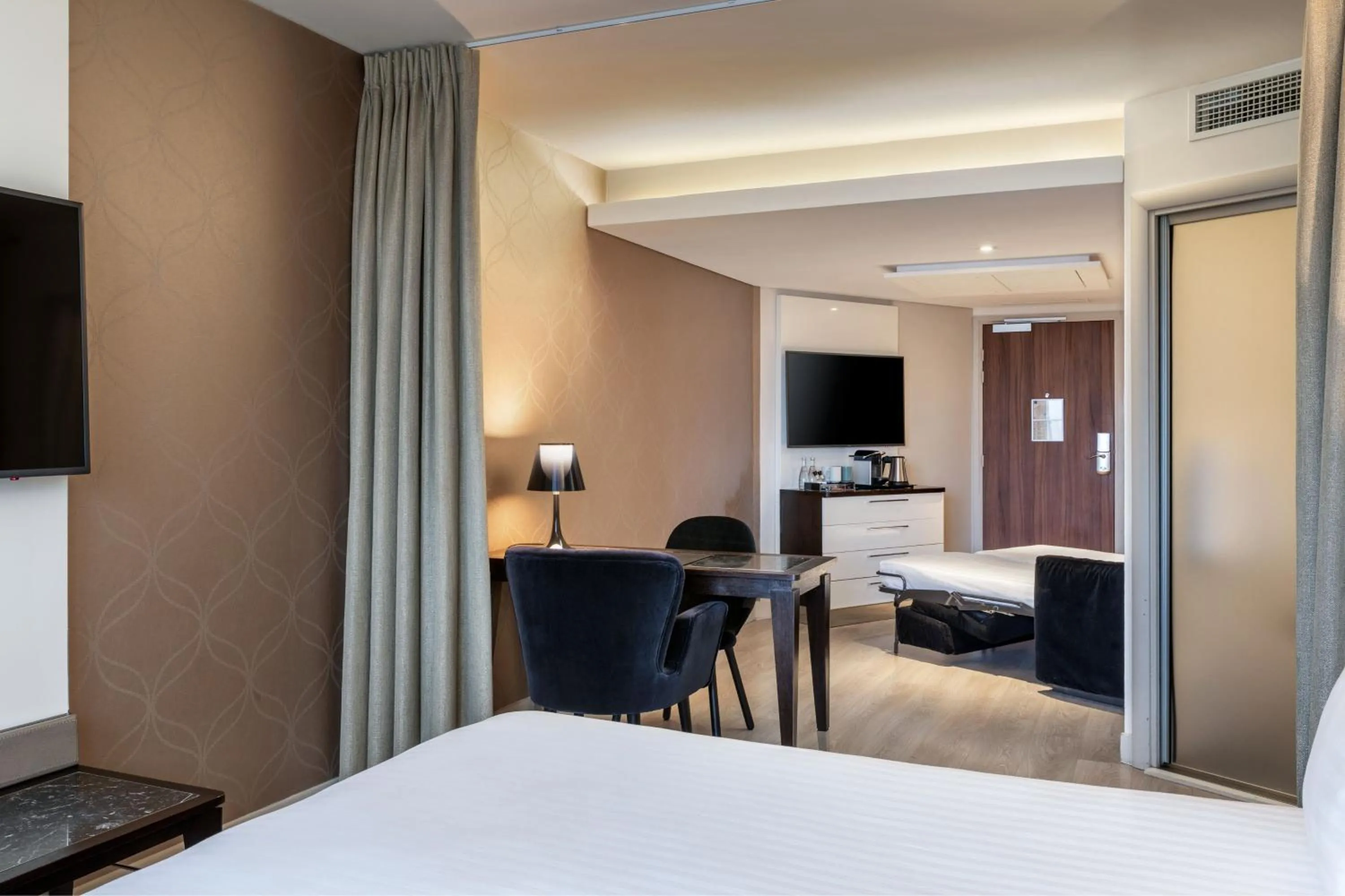 Photo of the whole room, Bed in AC Hotel Paris Porte Maillot by Marriott