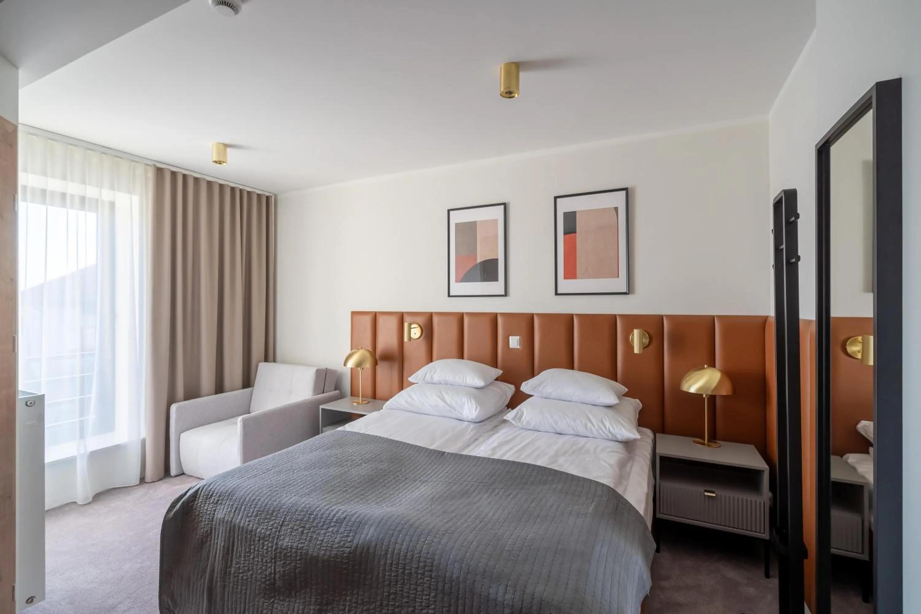 Bed in APARTHOTEL KLEOSIN