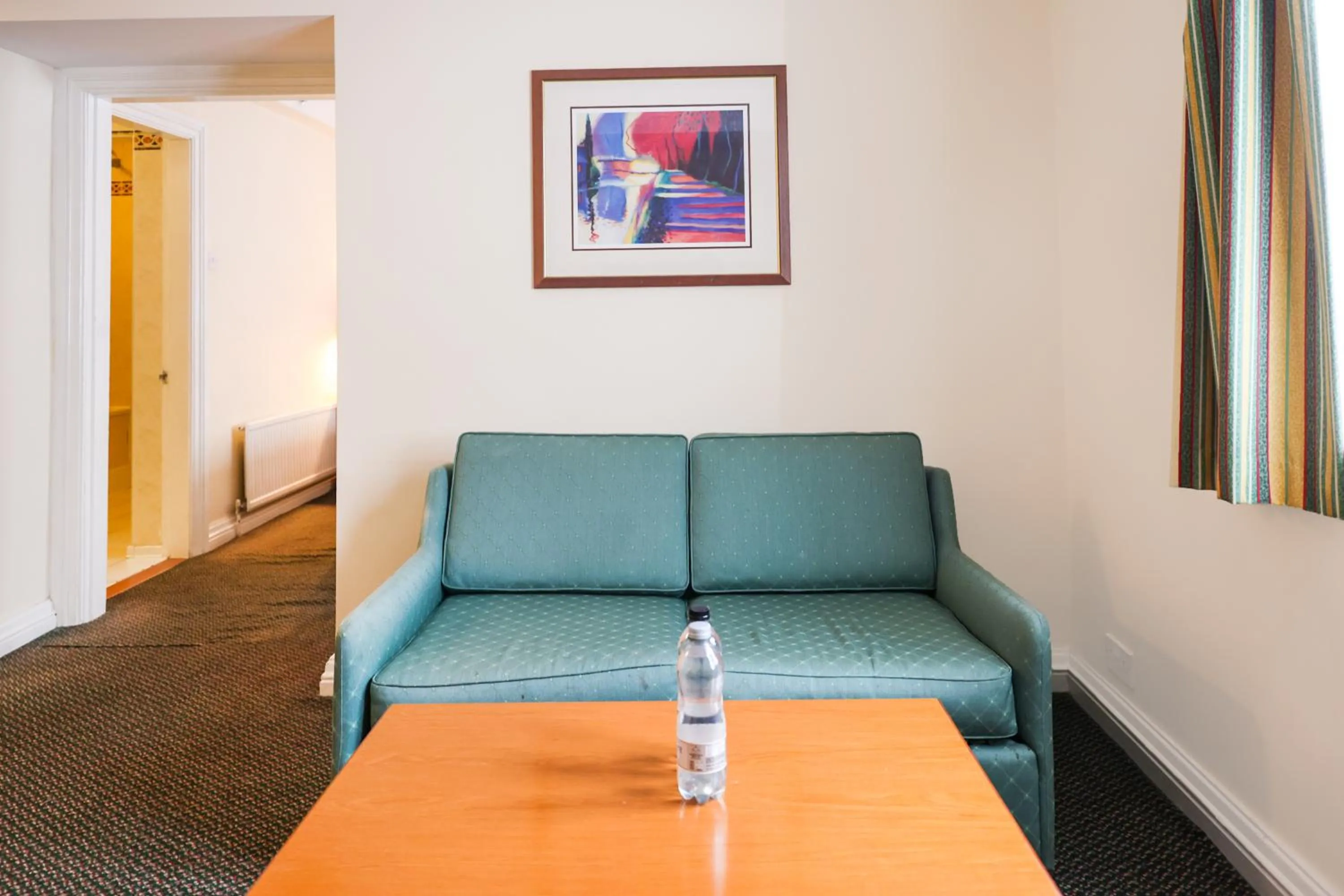Seating area in OYO Tong Park Hotel