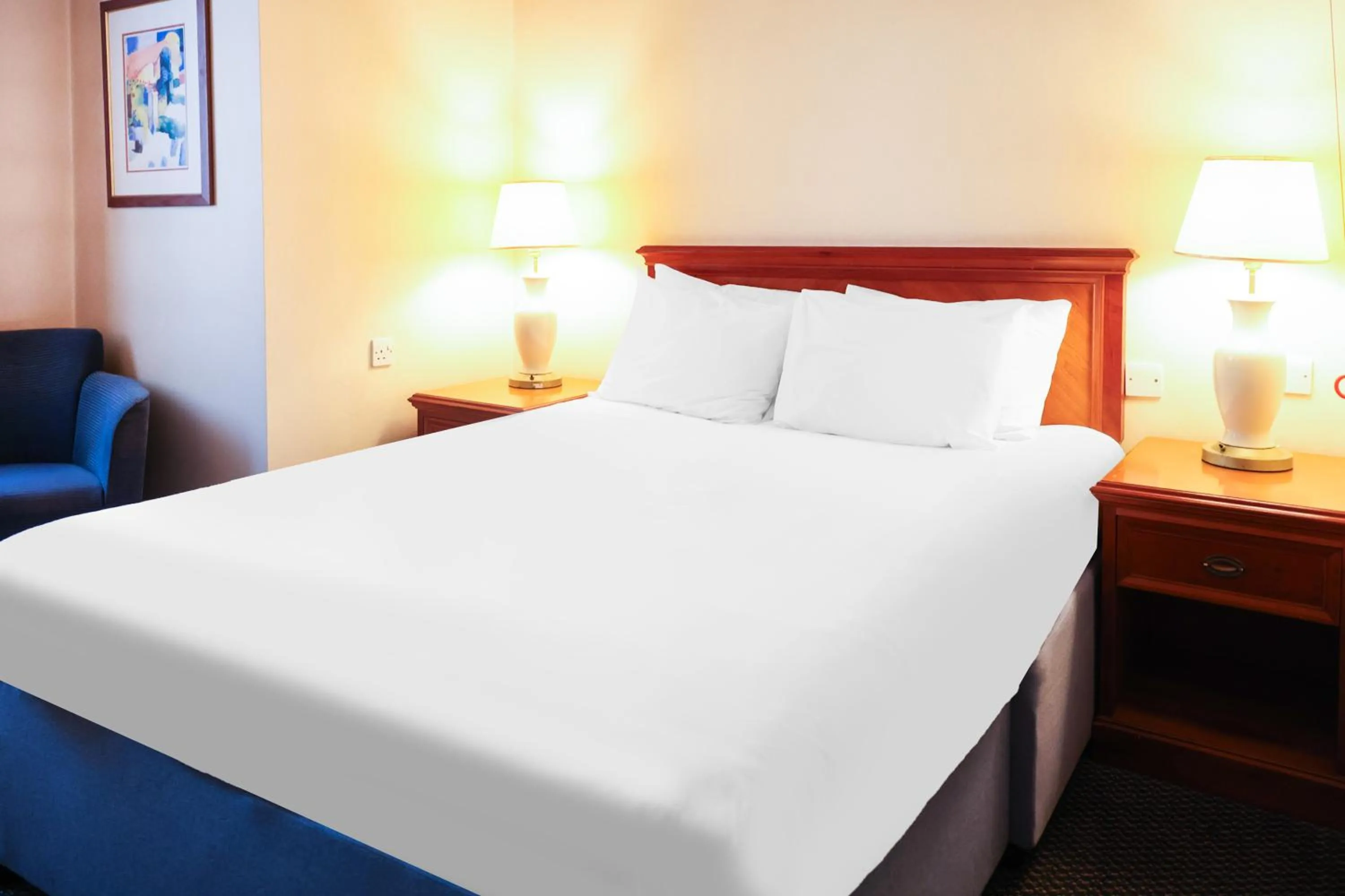 Bed in OYO Tong Park Hotel