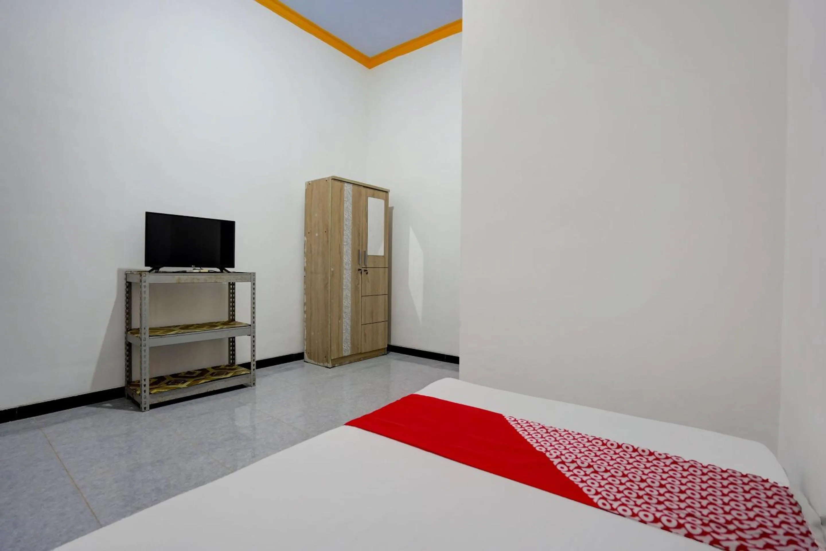 Bedroom in Hotel O Tri D Homestay Syariah