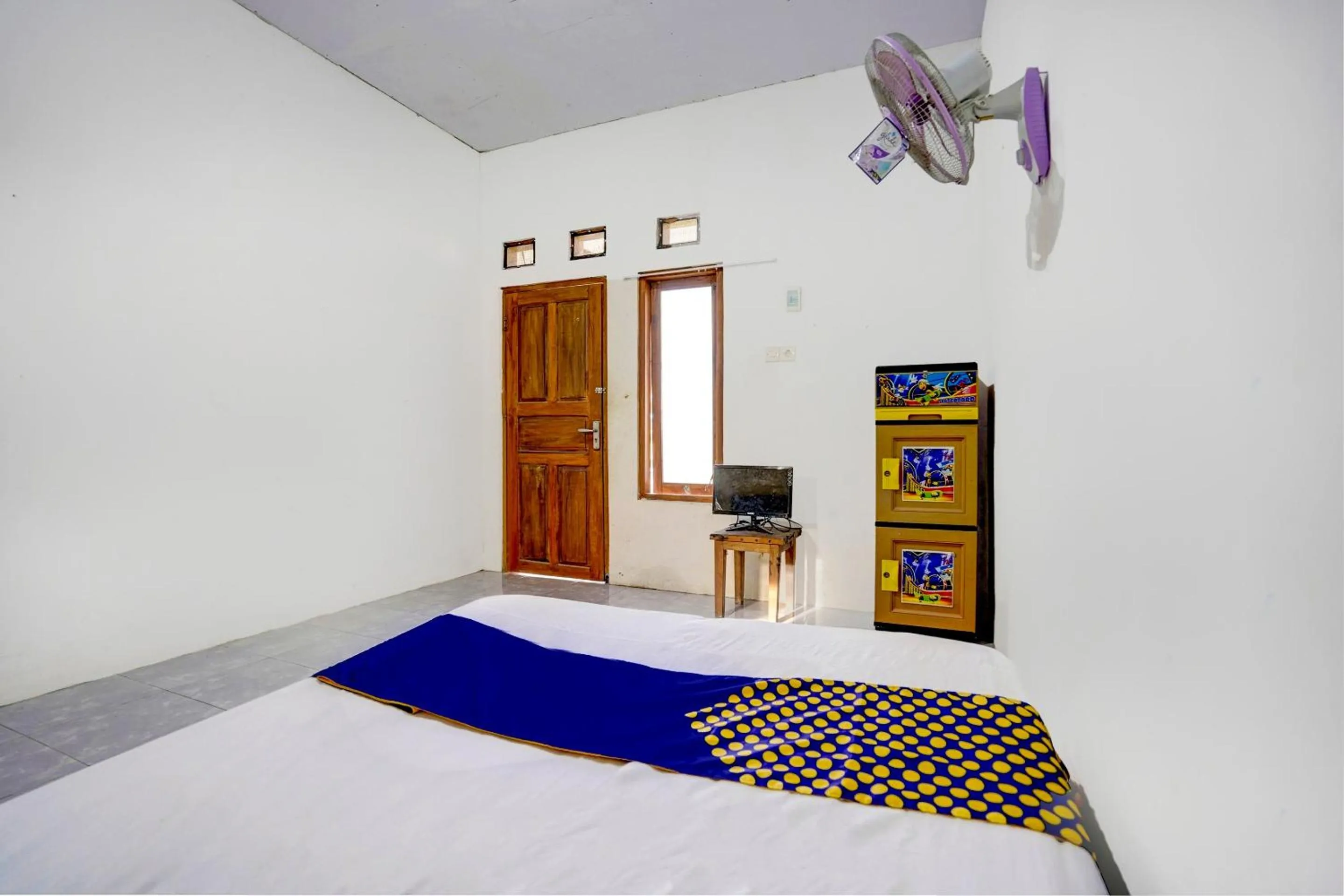 Bedroom, Bed in Hotel O Griya Sandi Syariah Rogojampi