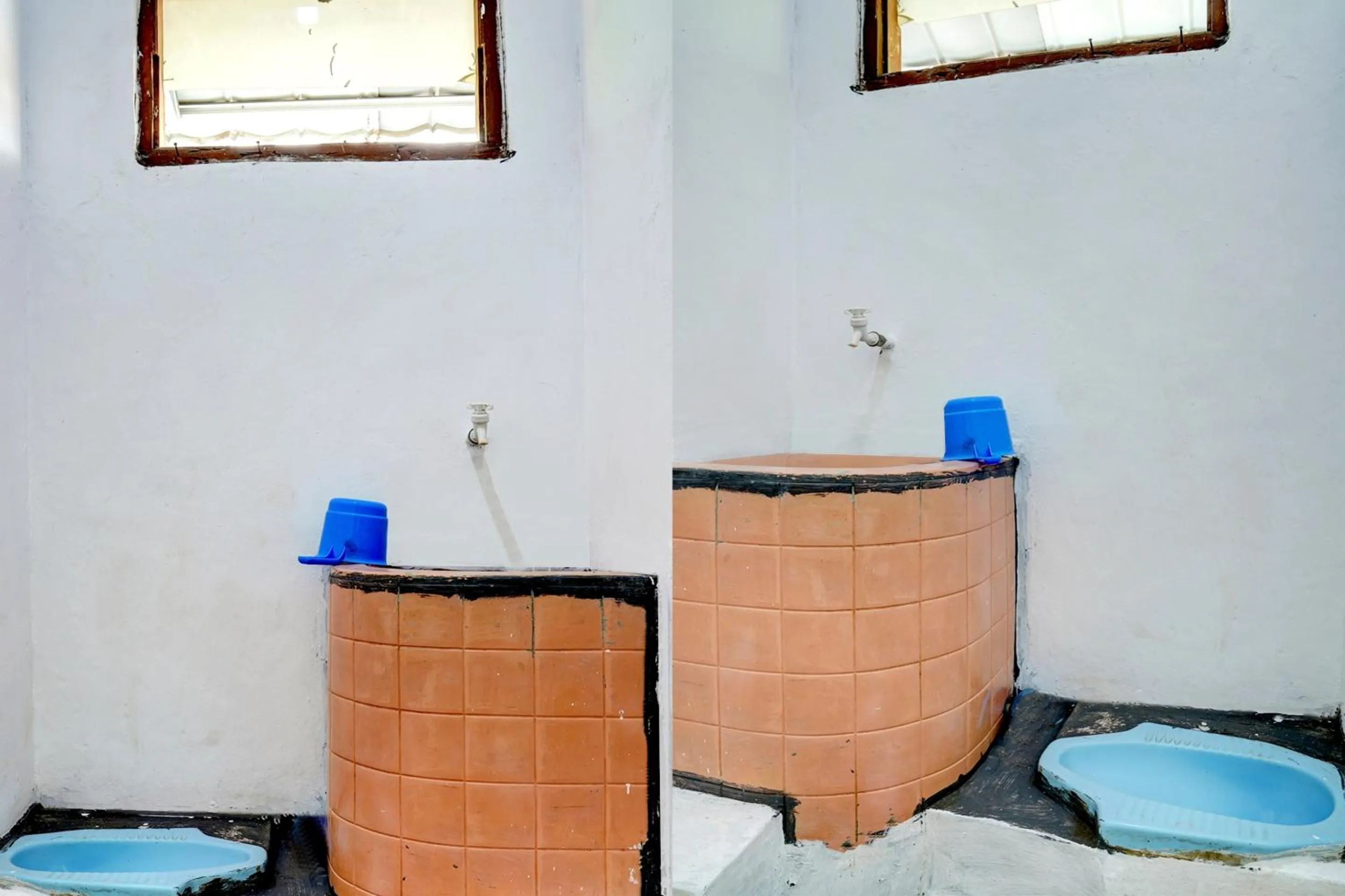 Bathroom in Hotel O Home Stay Syariah Aom Kusman