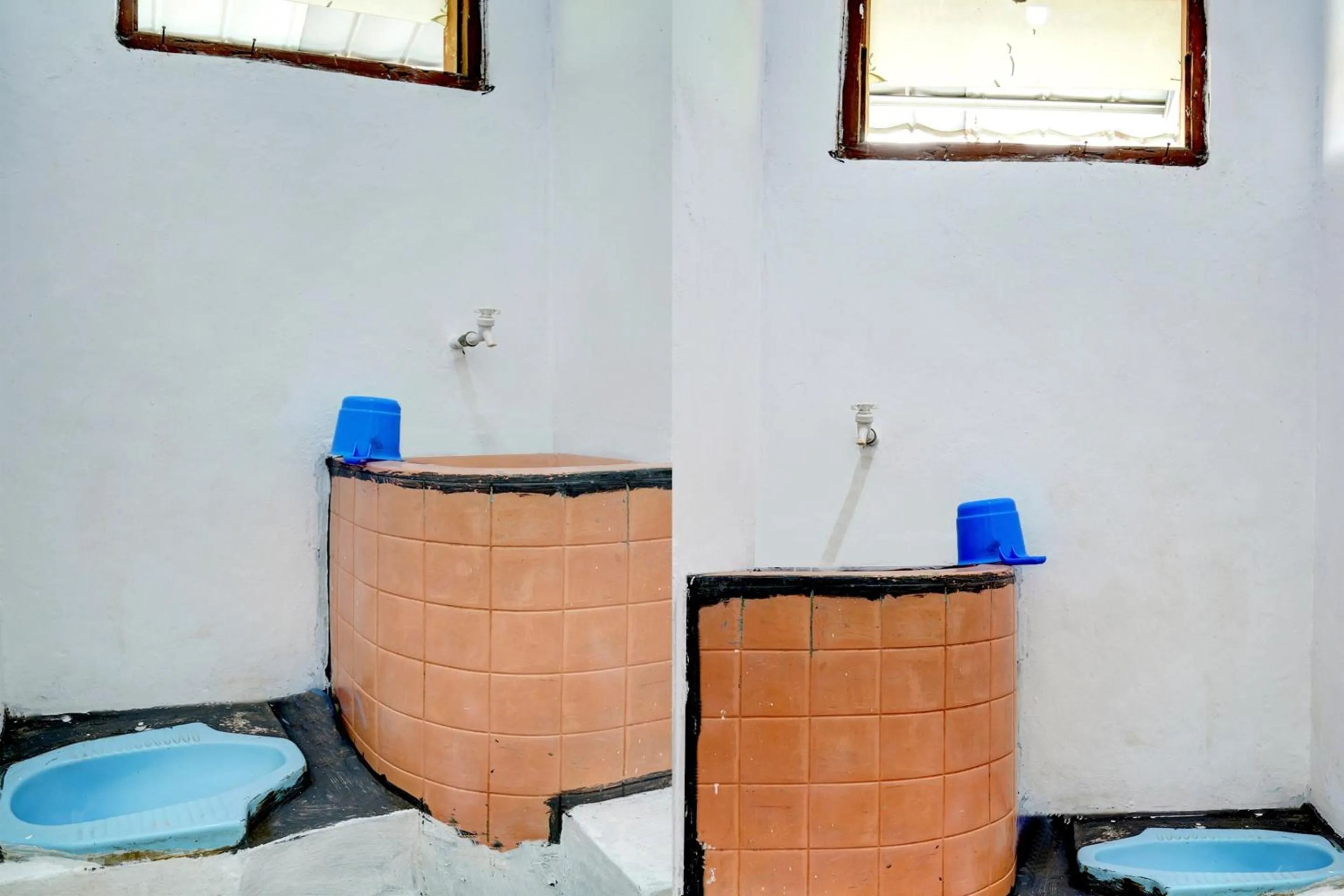 Bathroom in Hotel O Home Stay Syariah Aom Kusman