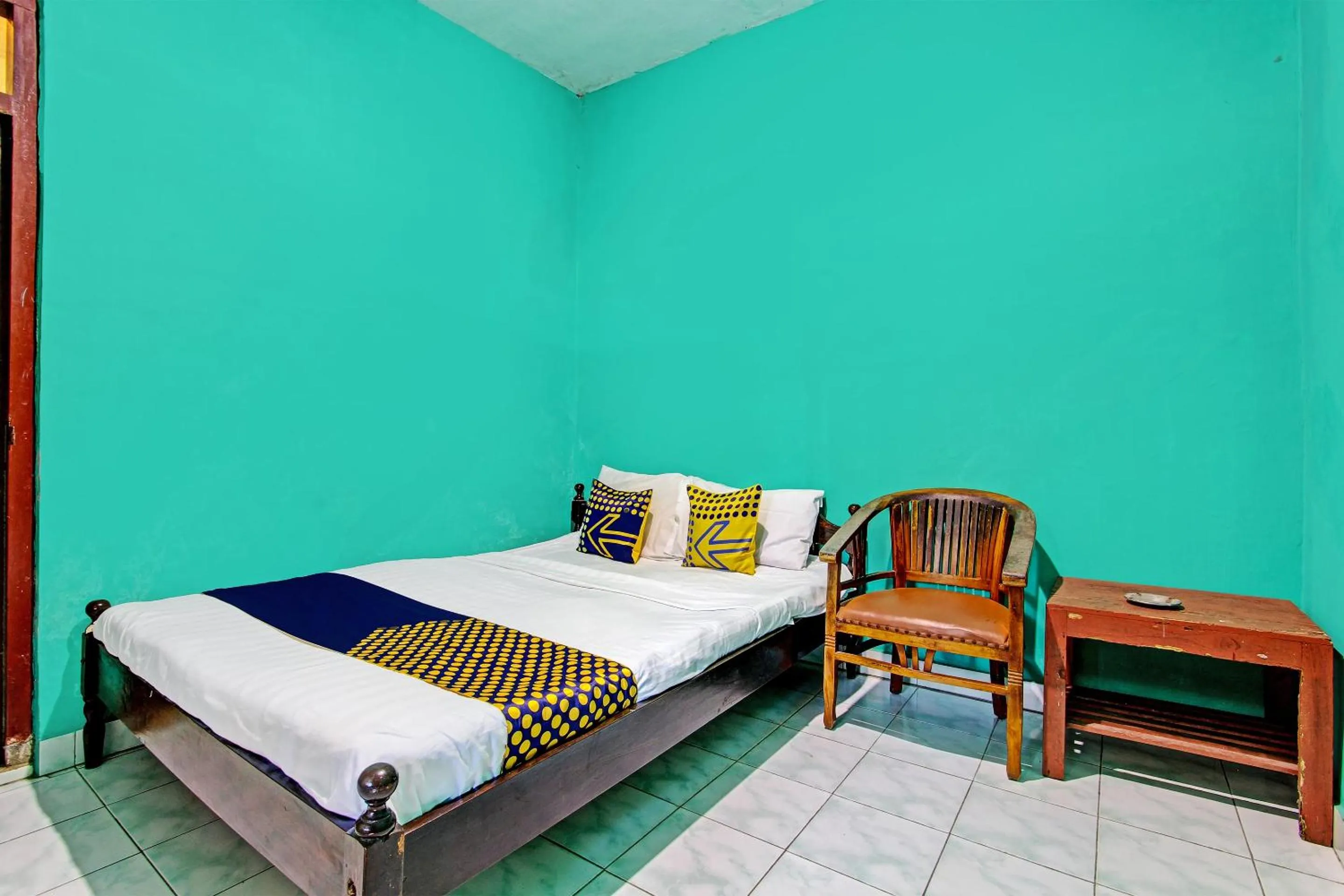 Bedroom in SPOT ON 92873 Losmen Parikesit