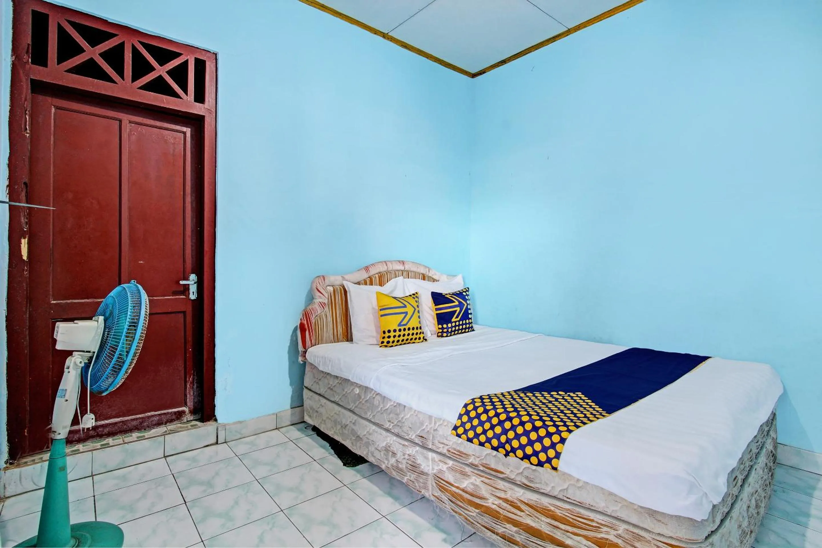 Bedroom in SPOT ON 92873 Losmen Parikesit